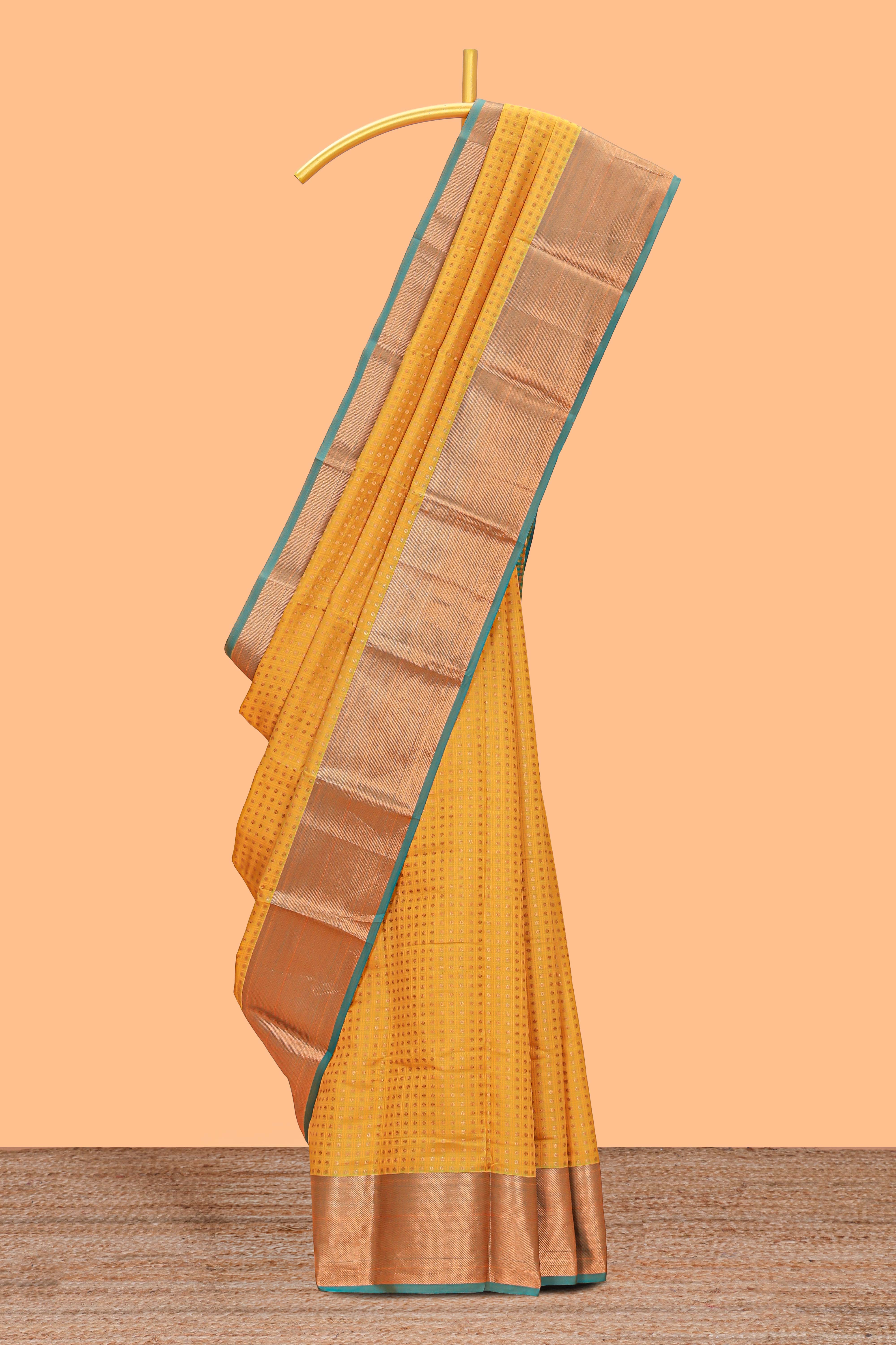 yellow shade zari motifs design semi soft silk saree with contrast border and matching motifs contrast blouse