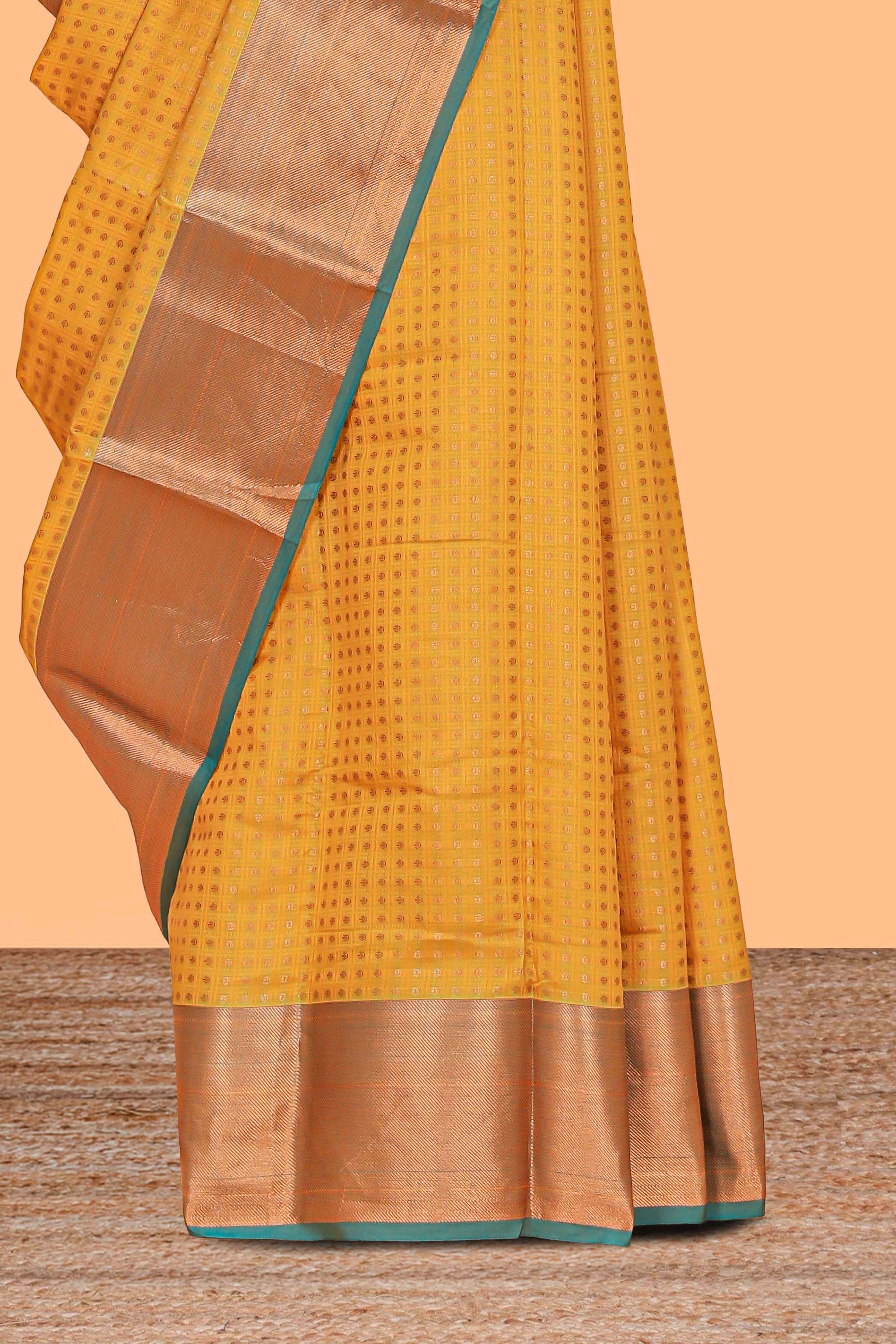 yellow shade zari motifs design semi soft silk saree with contrast border and matching motifs contrast blouse