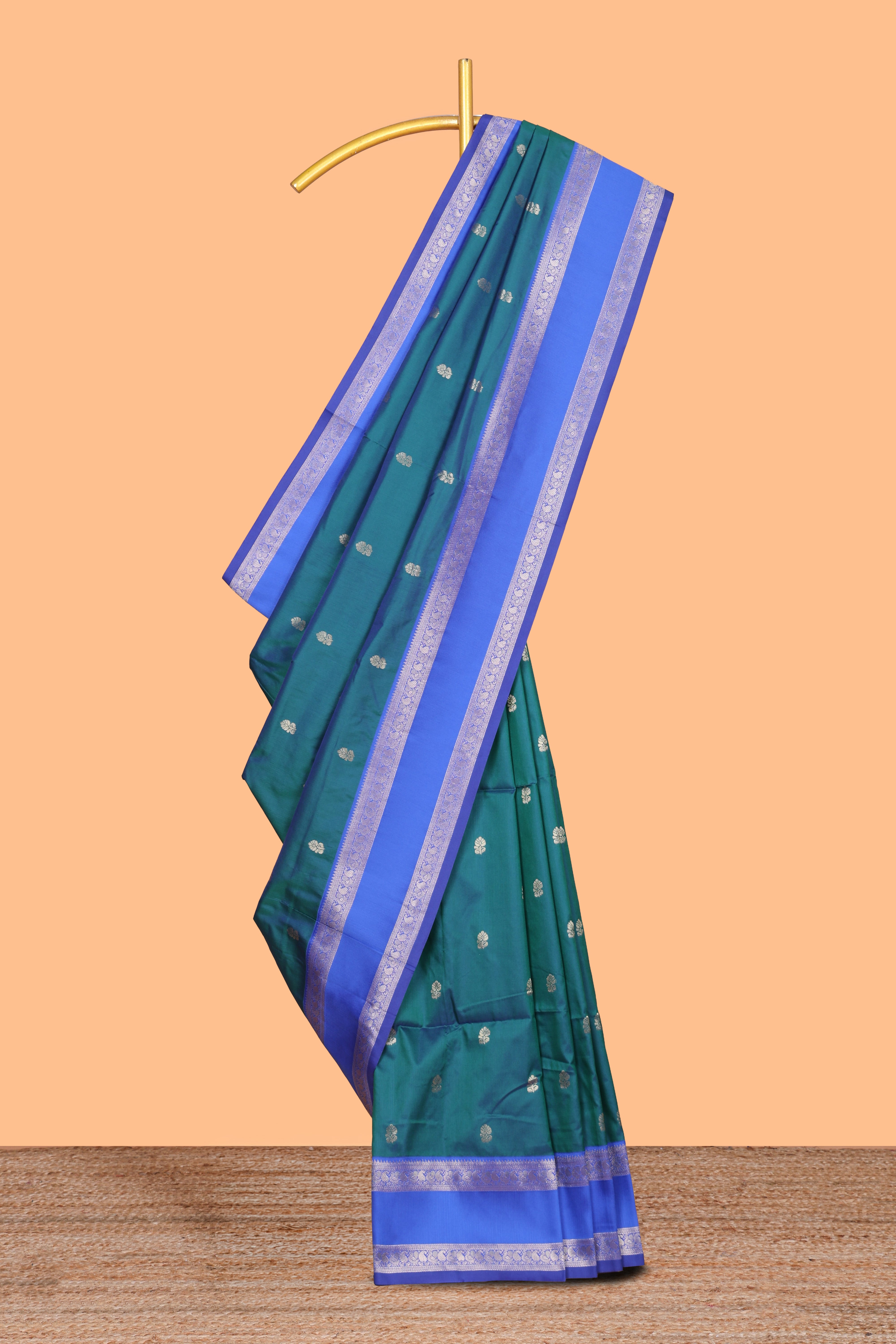 Peacock green Semi Soft Silk Saree delicate butta motifs with contrasting pallu elegant zari border along with contrast buttas blouse