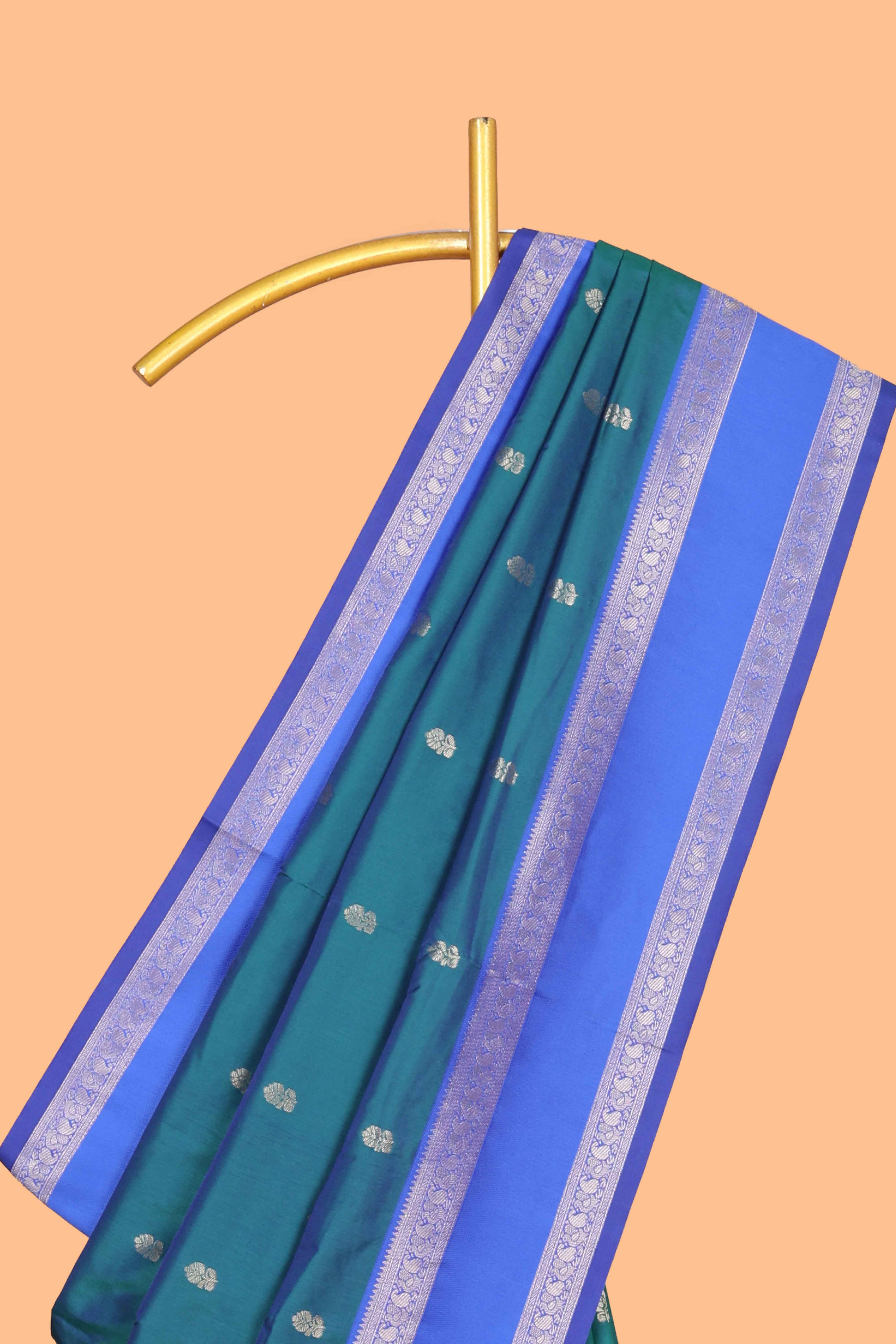 Peacock green Semi Soft Silk Saree delicate butta motifs with contrasting pallu elegant zari border along with contrast buttas blouse