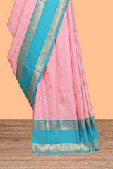 Light pink Semi Soft Silk Saree delicate butta motifs with contrasting pallu elegant zari border along with contrast buttas blouse