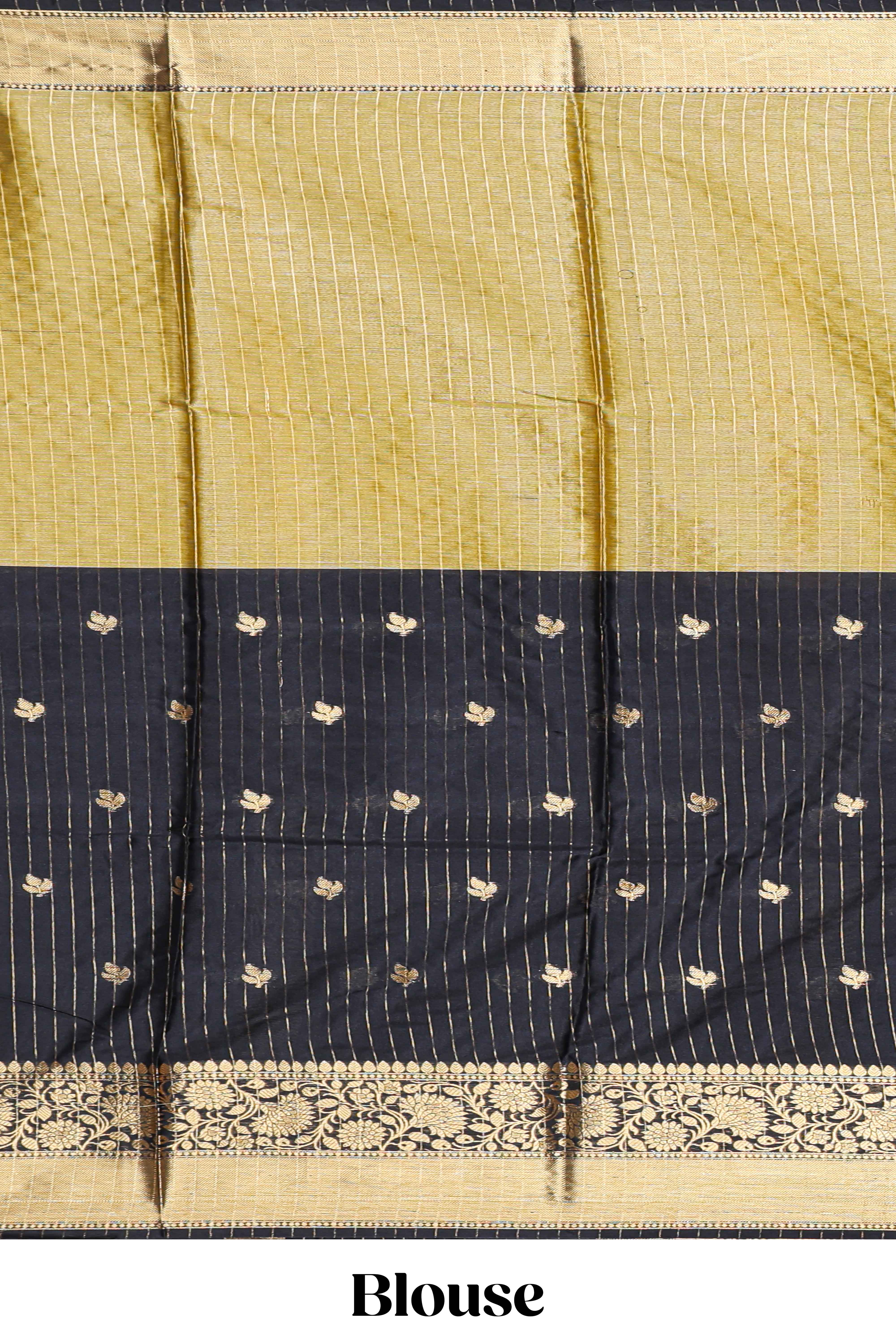 Black floral butta detailed Semi Soft Silk Saree with rich gold floral zari borders along with matching blouse