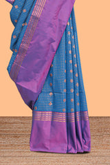 Steel blue checked floral design motifs semi soft silk saree with contrast border and blouse