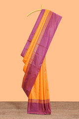 Orange checked floral design motifs semi soft silk saree with contrast border and blouse