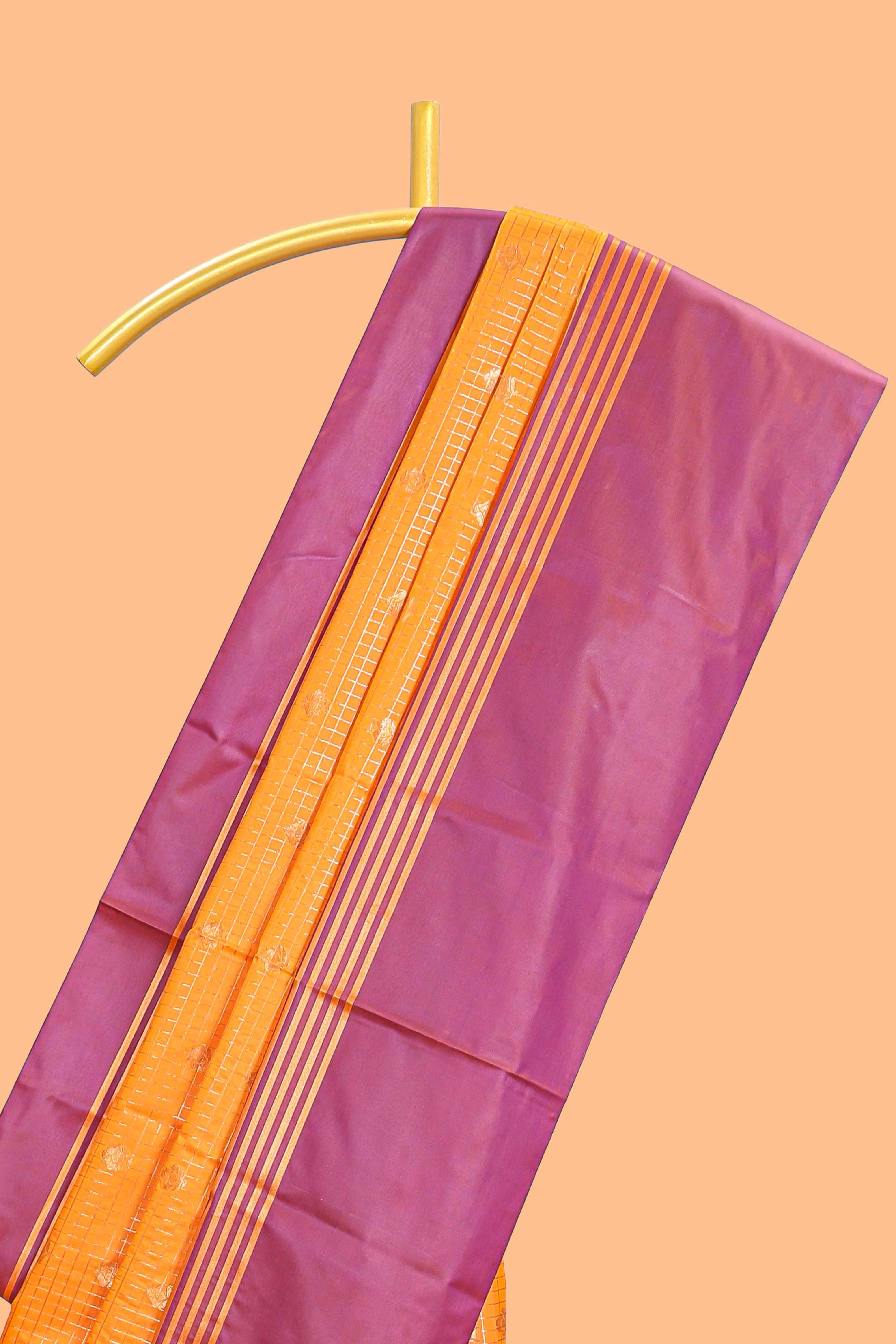 Orange checked floral design motifs semi soft silk saree with contrast border and blouse
