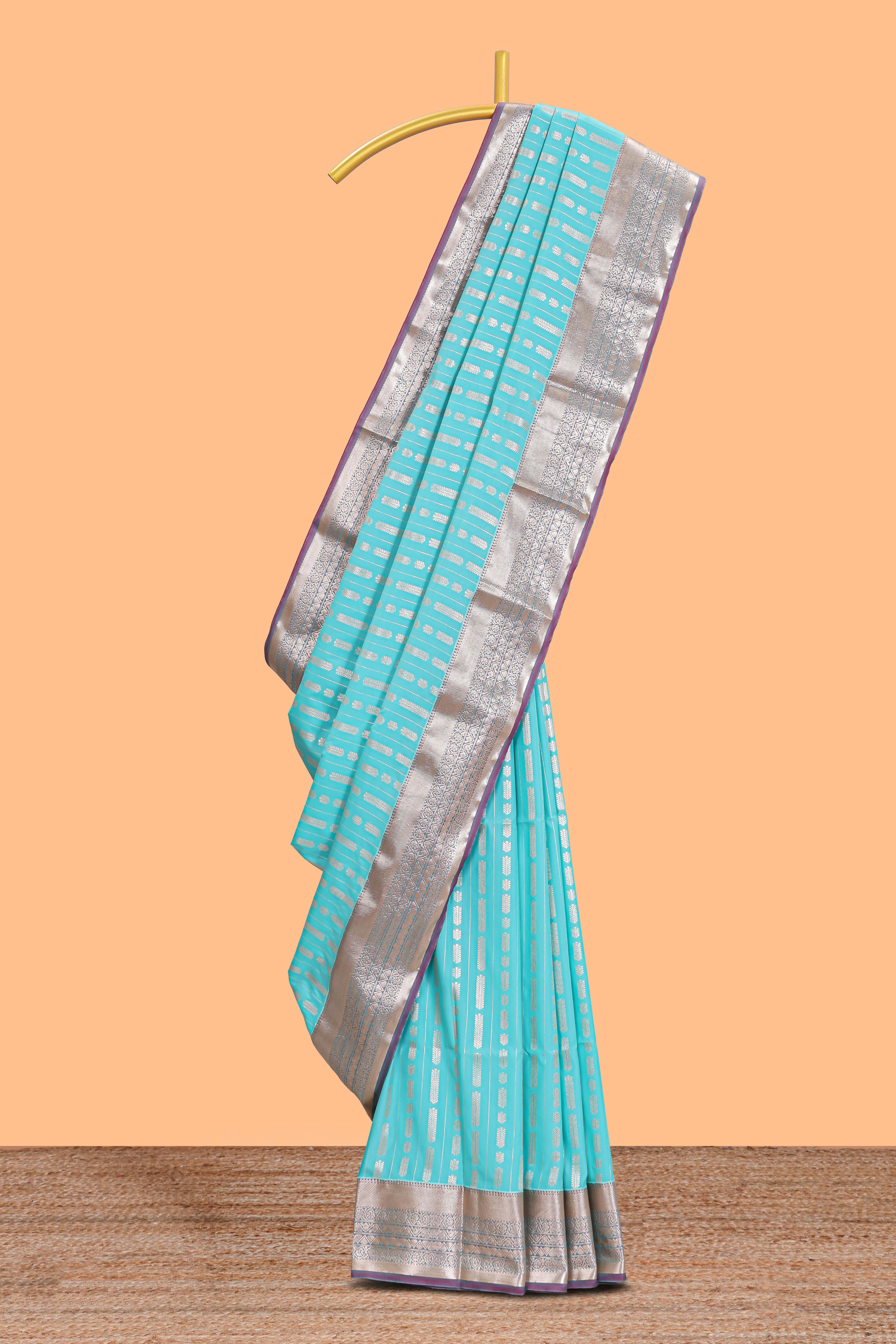 Blue striped floral design semi soft silk saree with contrast border and blouse