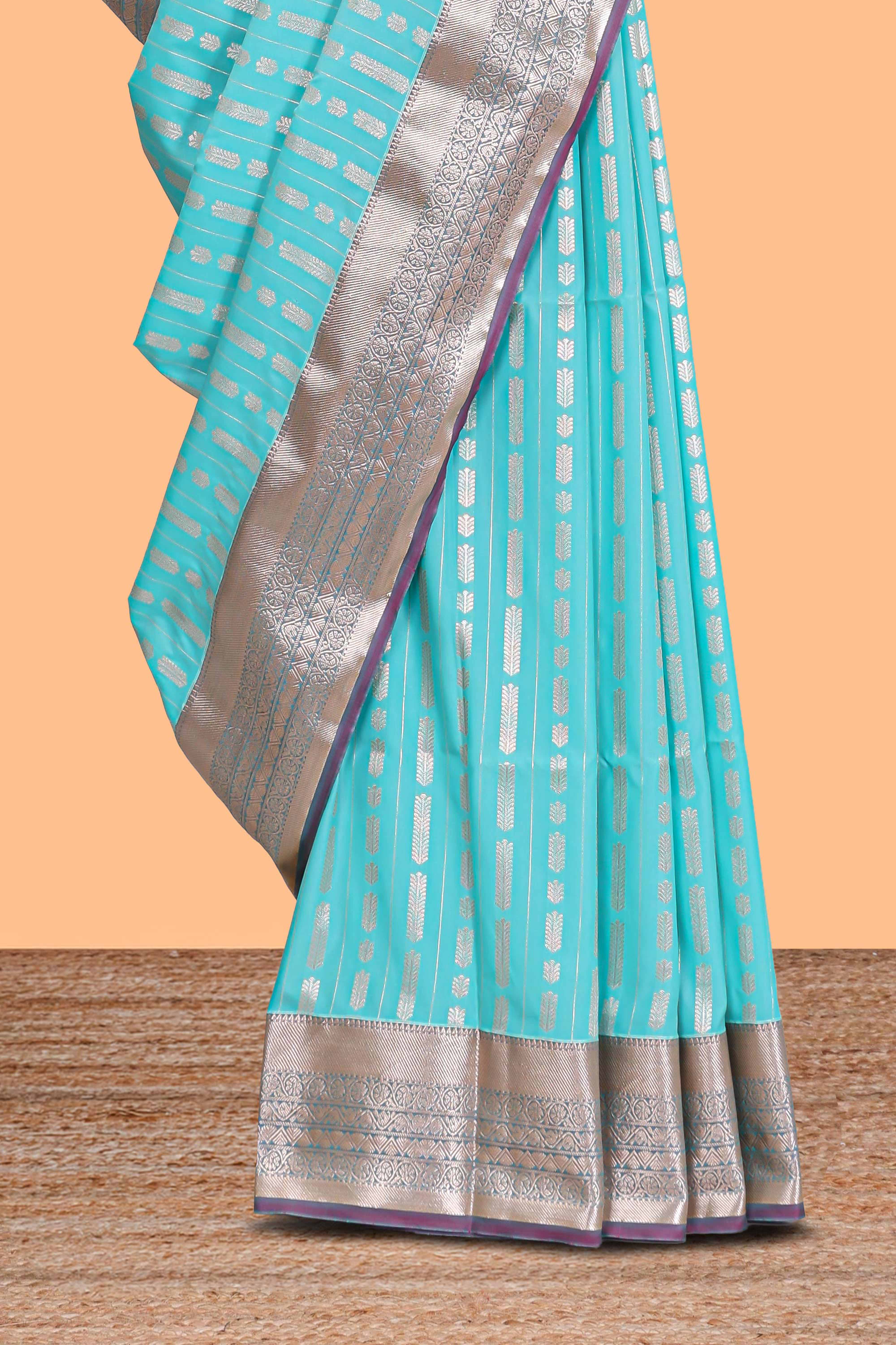 Blue striped floral design semi soft silk saree with contrast border and blouse