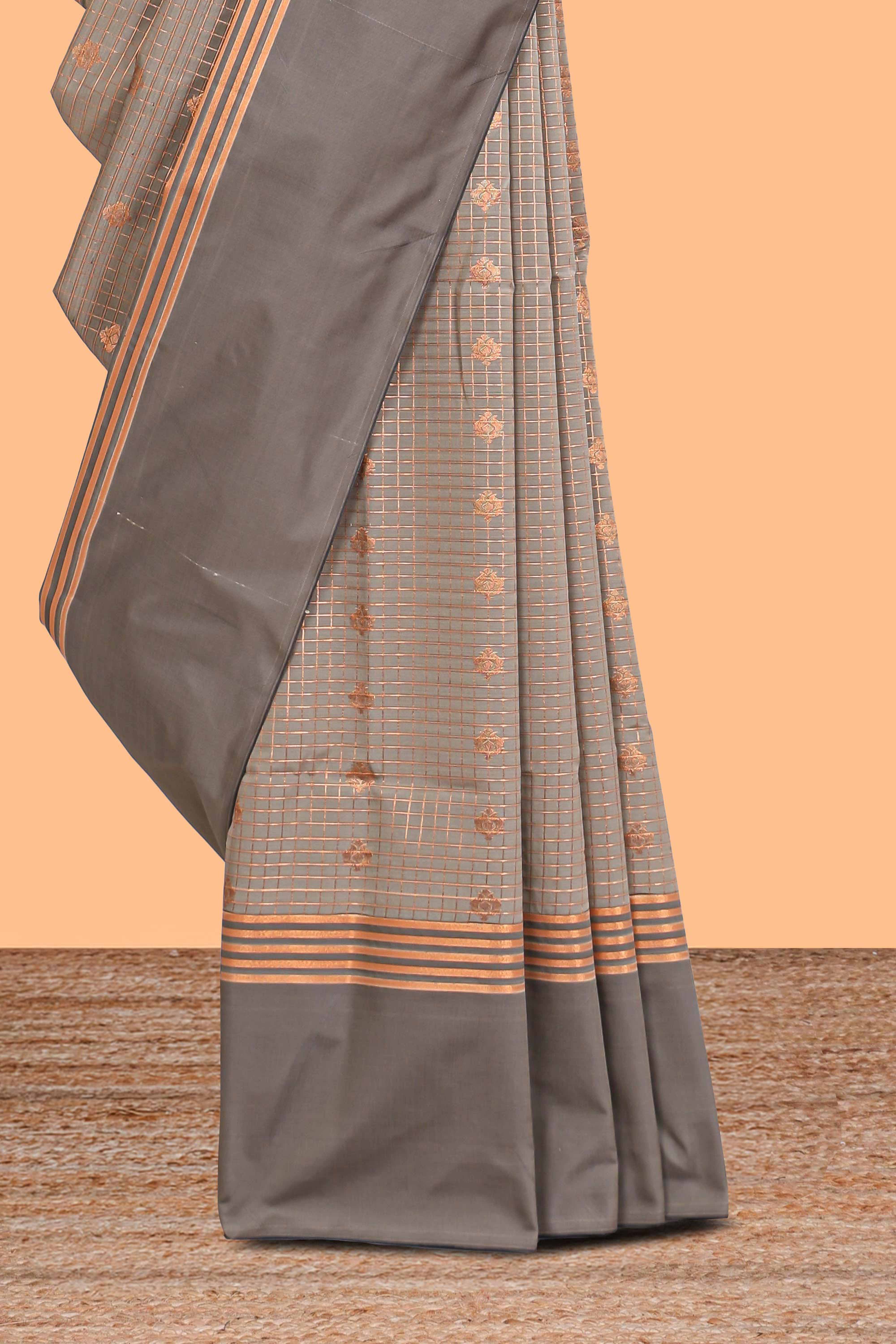 Grey checked floral design motifs semi soft silk saree with contrast border and blouse