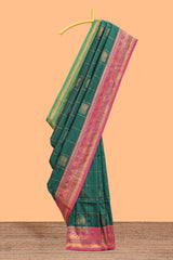 Green checked floral design motifs semi soft silk saree with contrast border and matching blouse