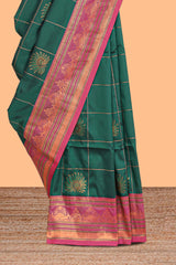 Green checked floral design motifs semi soft silk saree with contrast border and matching blouse