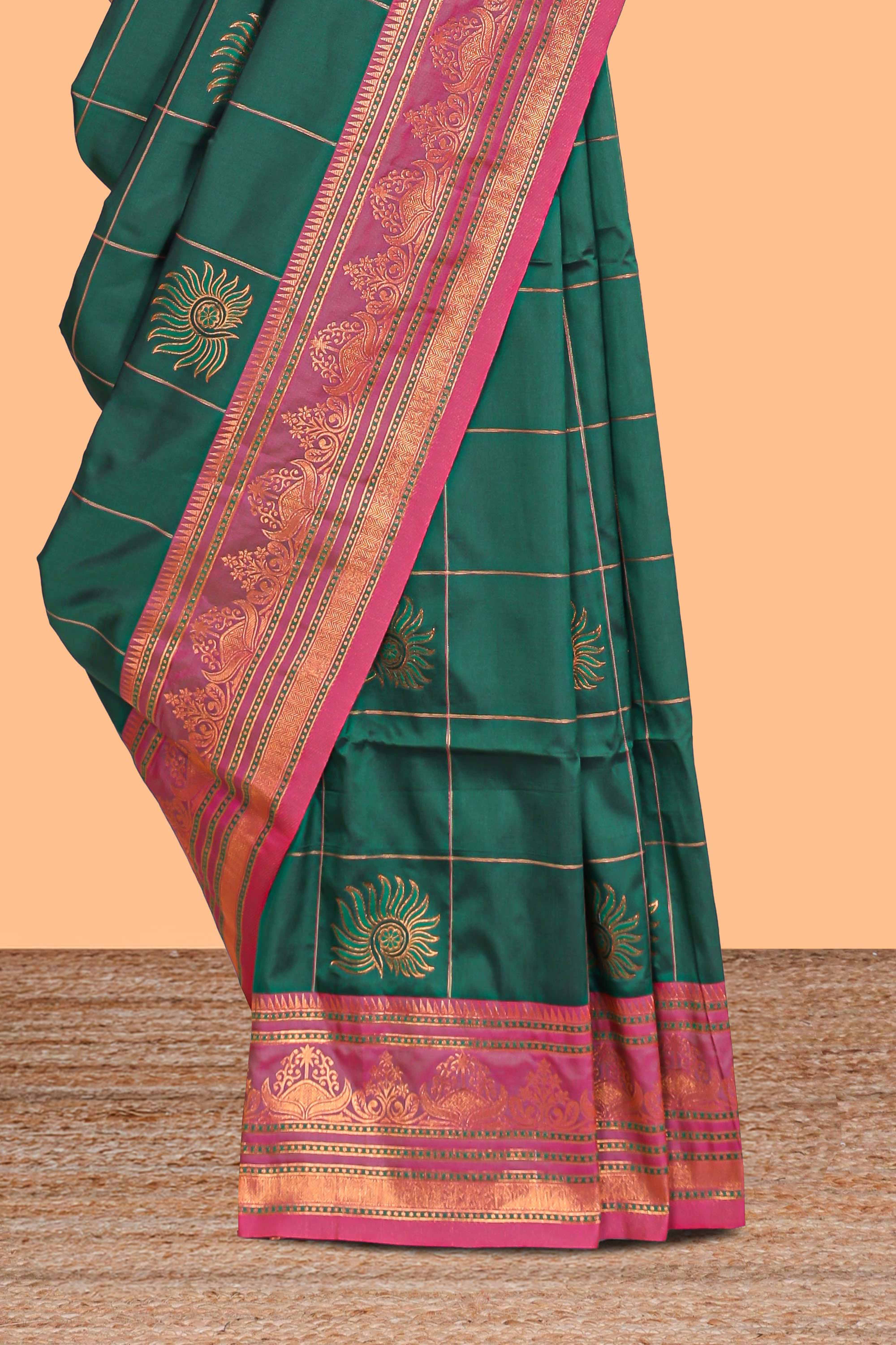 Green checked floral design motifs semi soft silk saree with contrast border and matching blouse