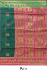 Green checked floral design motifs semi soft silk saree with contrast border and matching blouse
