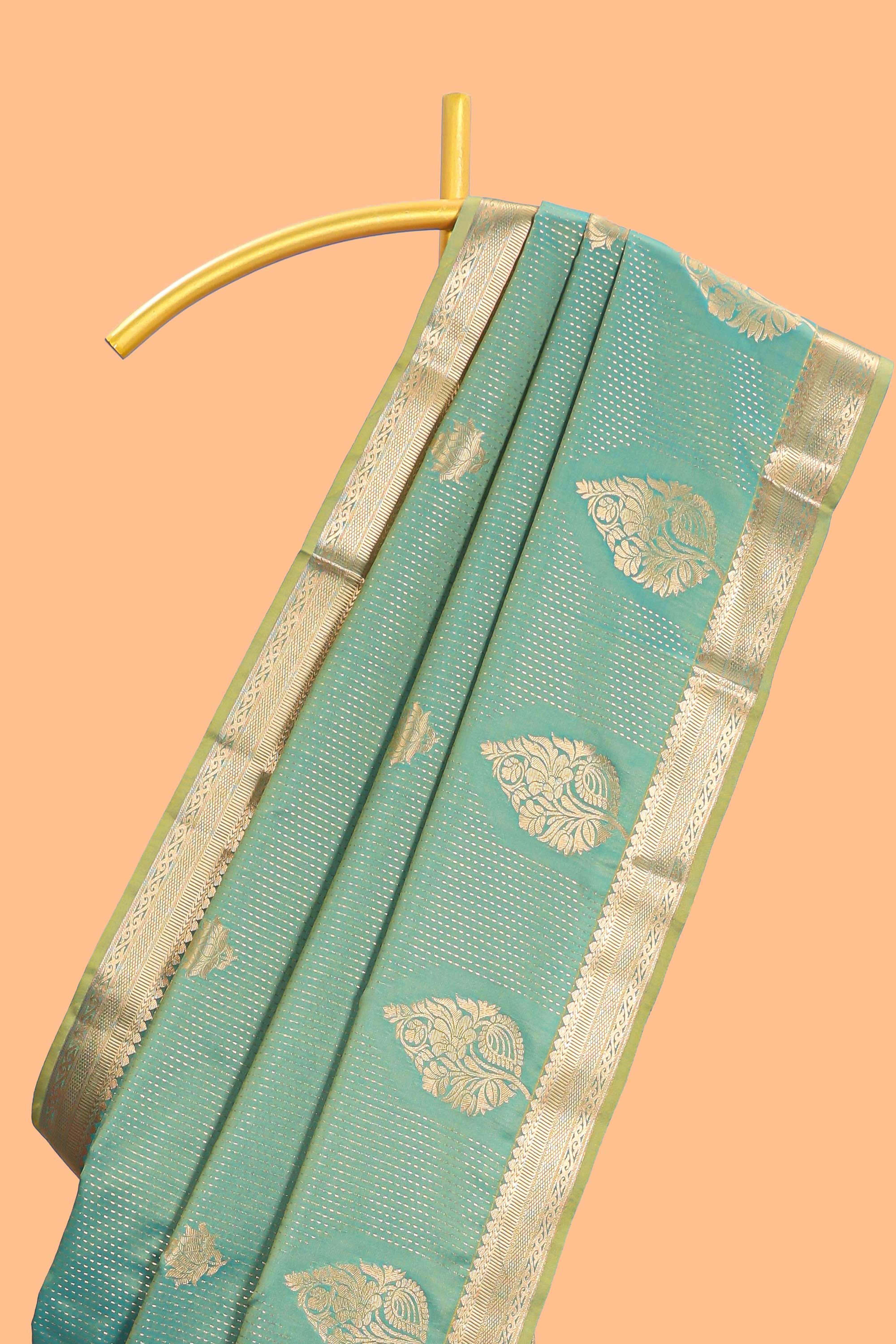 Green floral design motifs semi soft silk saree with self border and contrast blouse