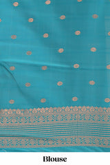 Multi color checked floral design motifs semi soft silk saree with contrast border and blouse