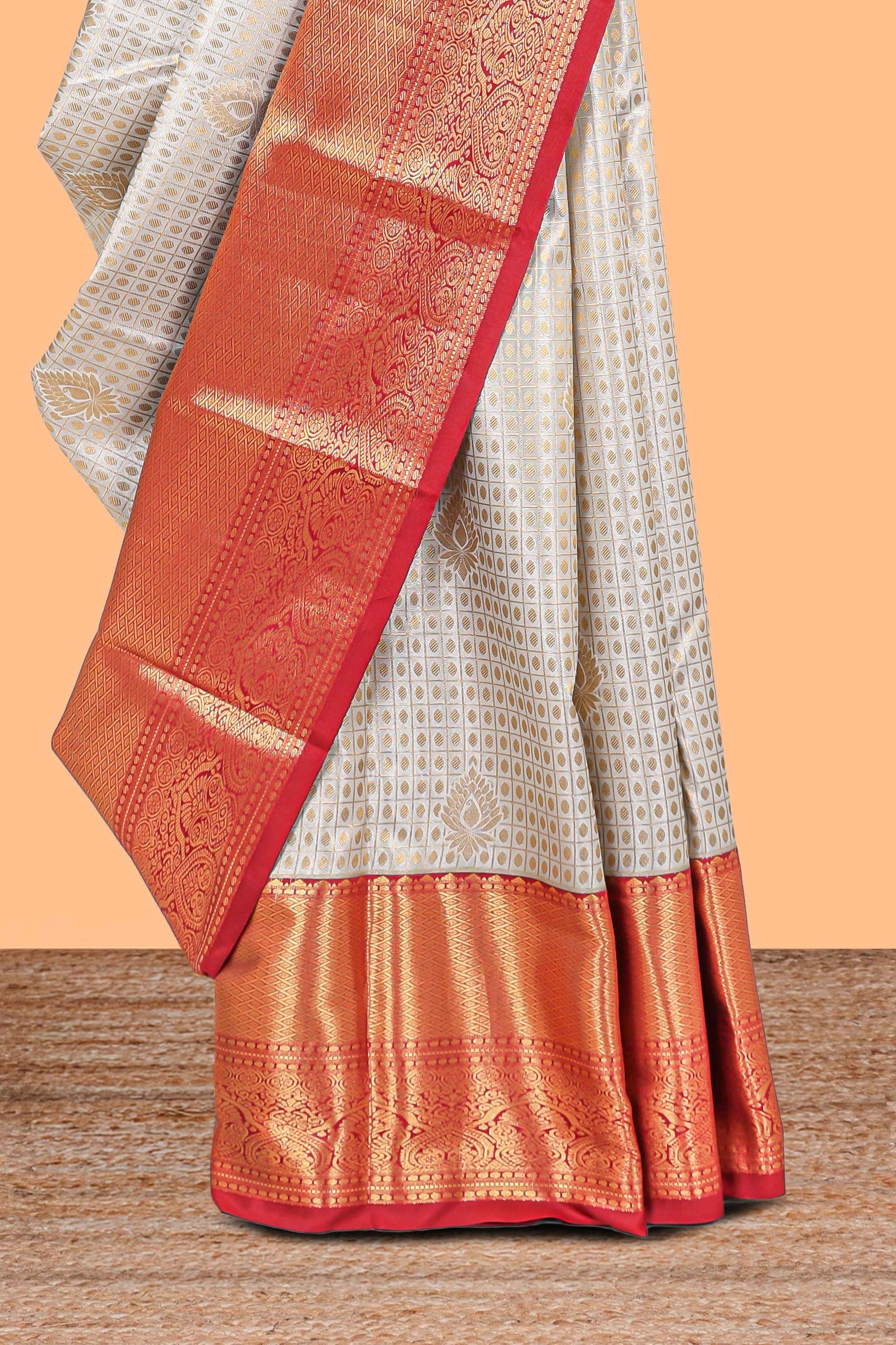 Cream shade checked butta design Semi Soft Silk Saree with contrast zari border along with contrasting blouse