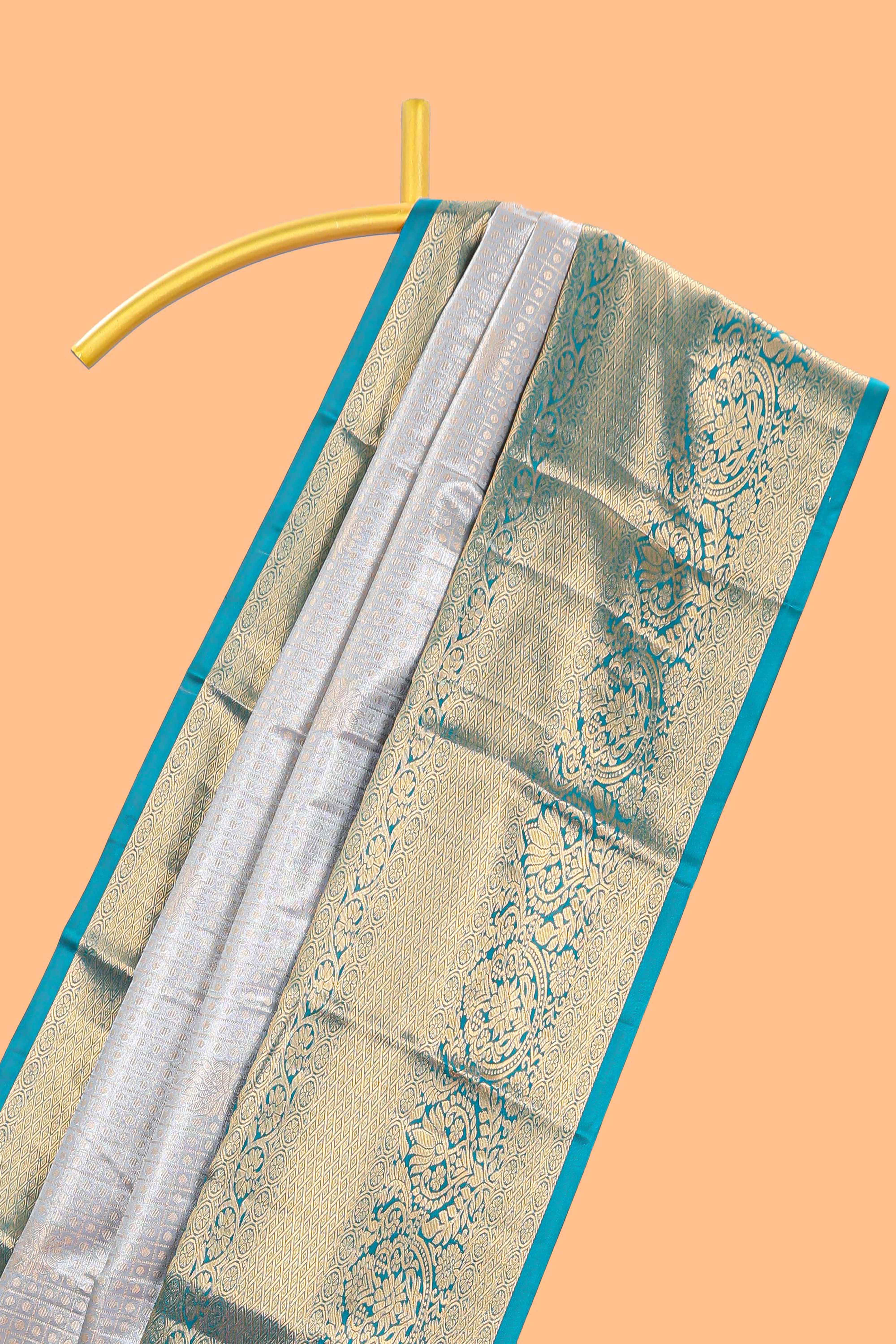 Grey shade checked butta design Semi Soft Silk Saree with pink contrast zari border along with contrasting blouse