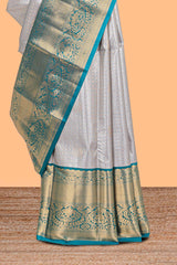 Grey shade checked butta design Semi Soft Silk Saree with pink contrast zari border along with contrasting blouse