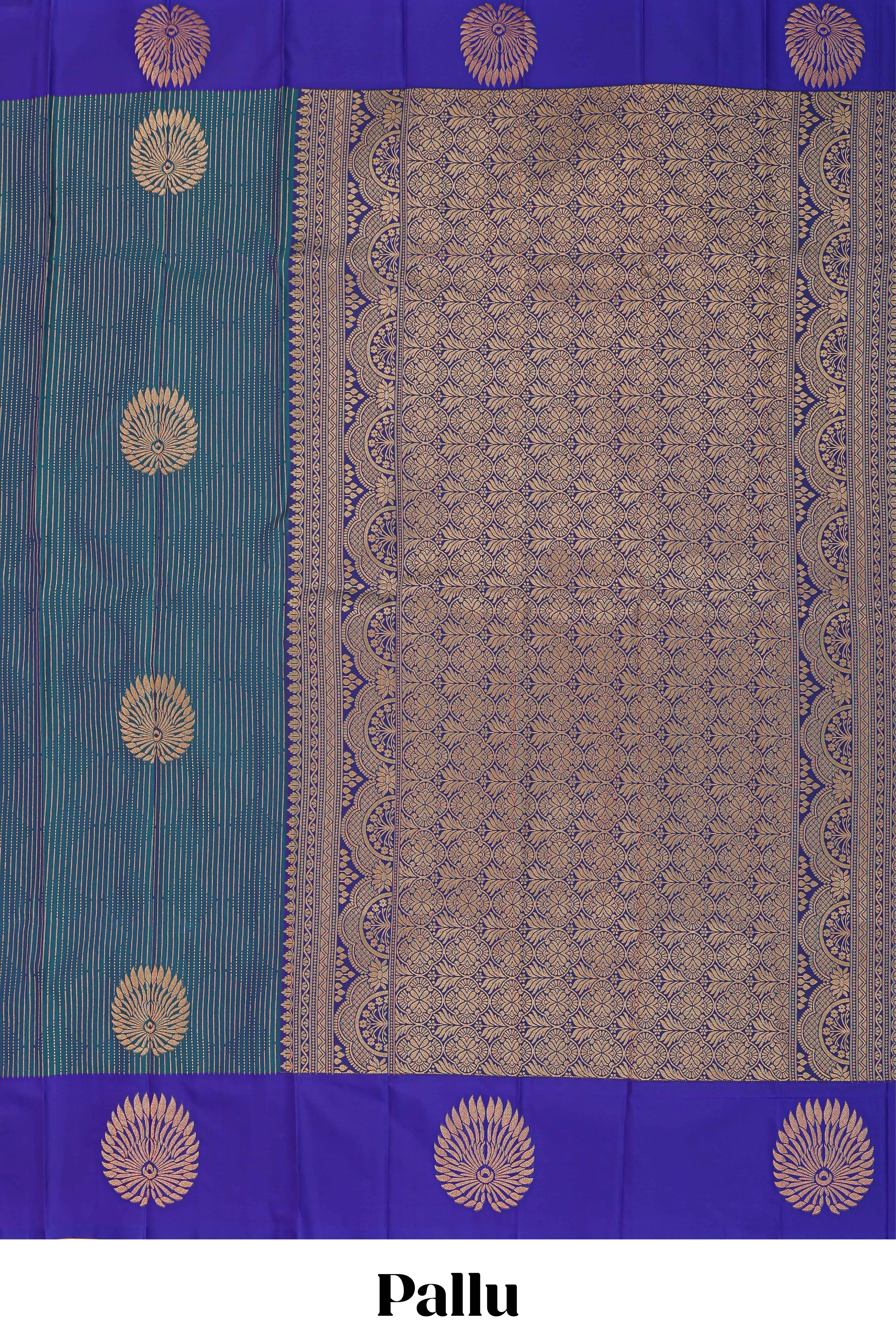 Peacock blue striped zari motifs semi soft silk saree with contrast border and blouse