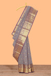 Multi color checked zari motifs semi soft silk saree with contrast border and motifs blouse