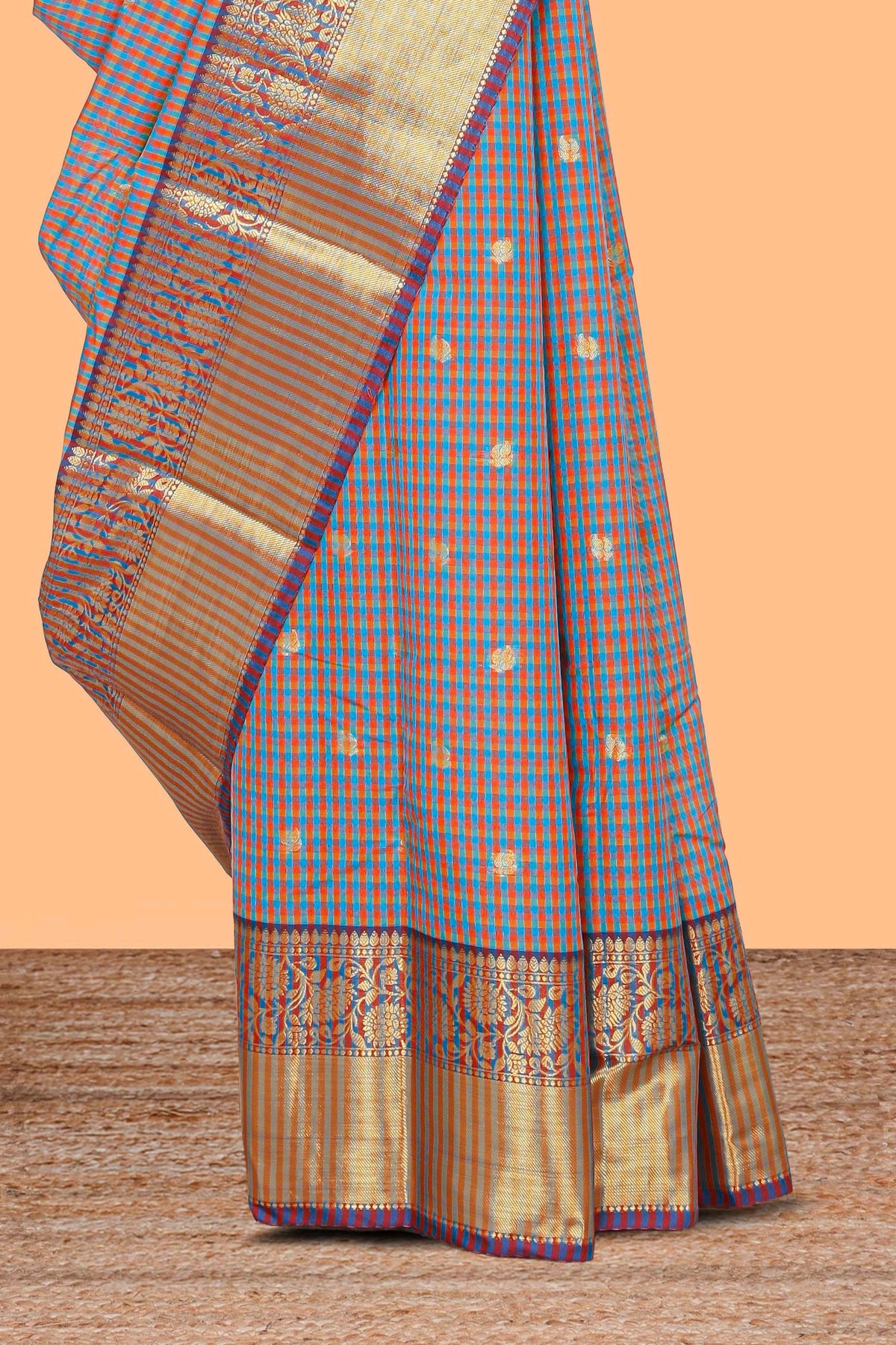 Multi color checked zari motifs semi soft silk saree with contrast border and motifs blouse