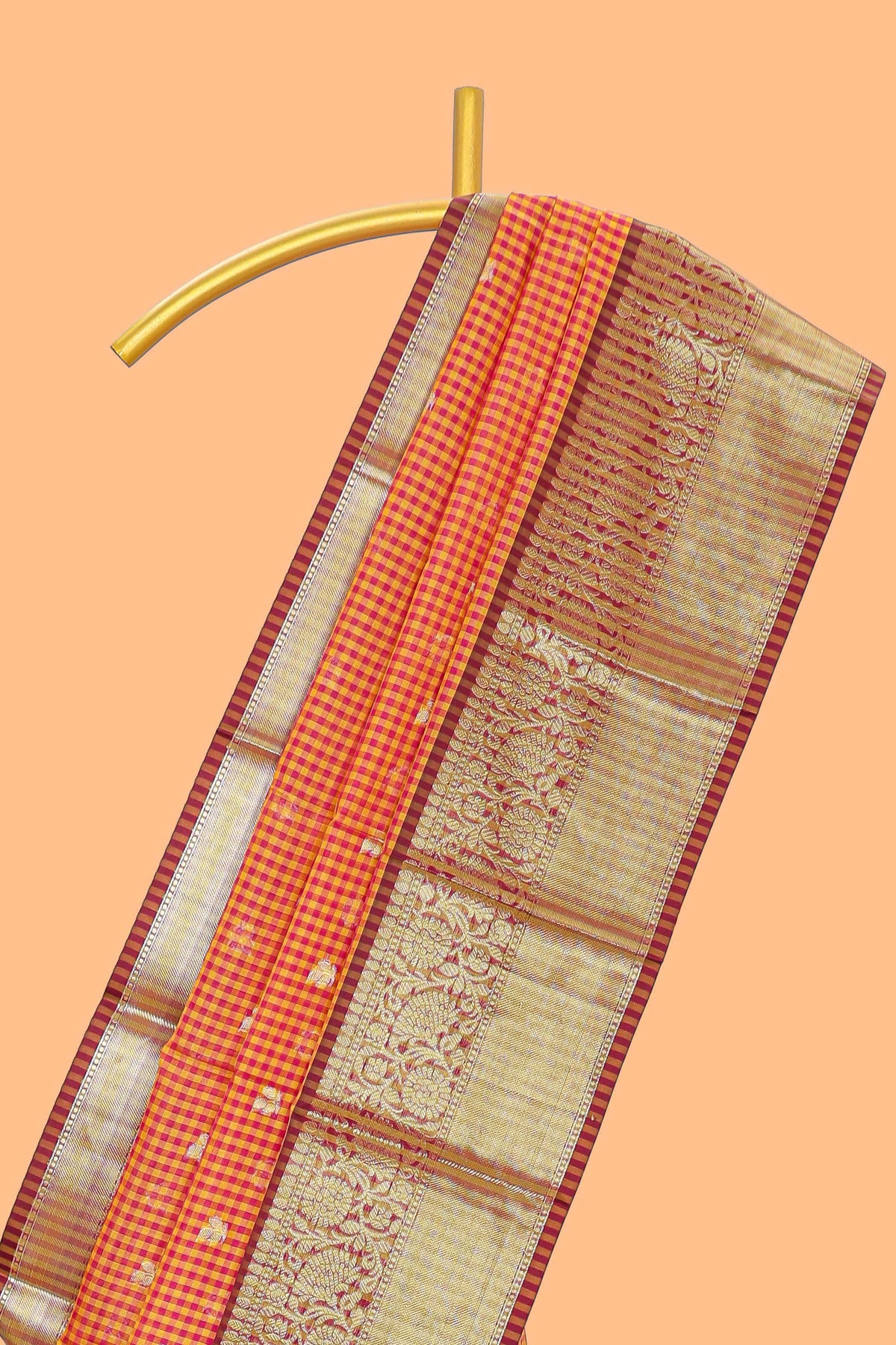 Orange and pink checked zari motifs semi soft silk saree with contrast zari border and motifs blouse