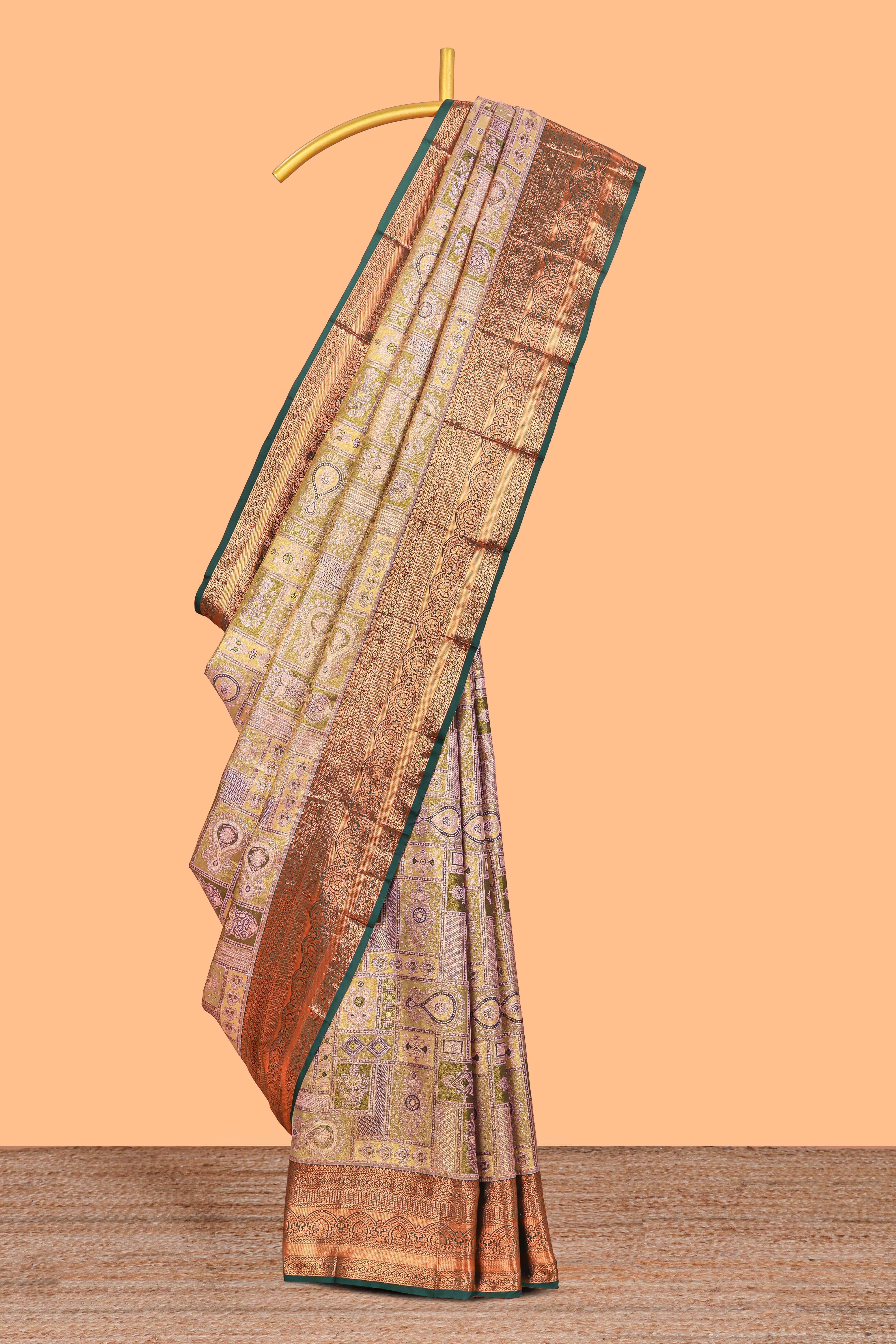 Pastel Sage Green Tissue Silk Saree with Antique Gold Zari Weaving and Dark Green Contrast Border and Contrast Blouse