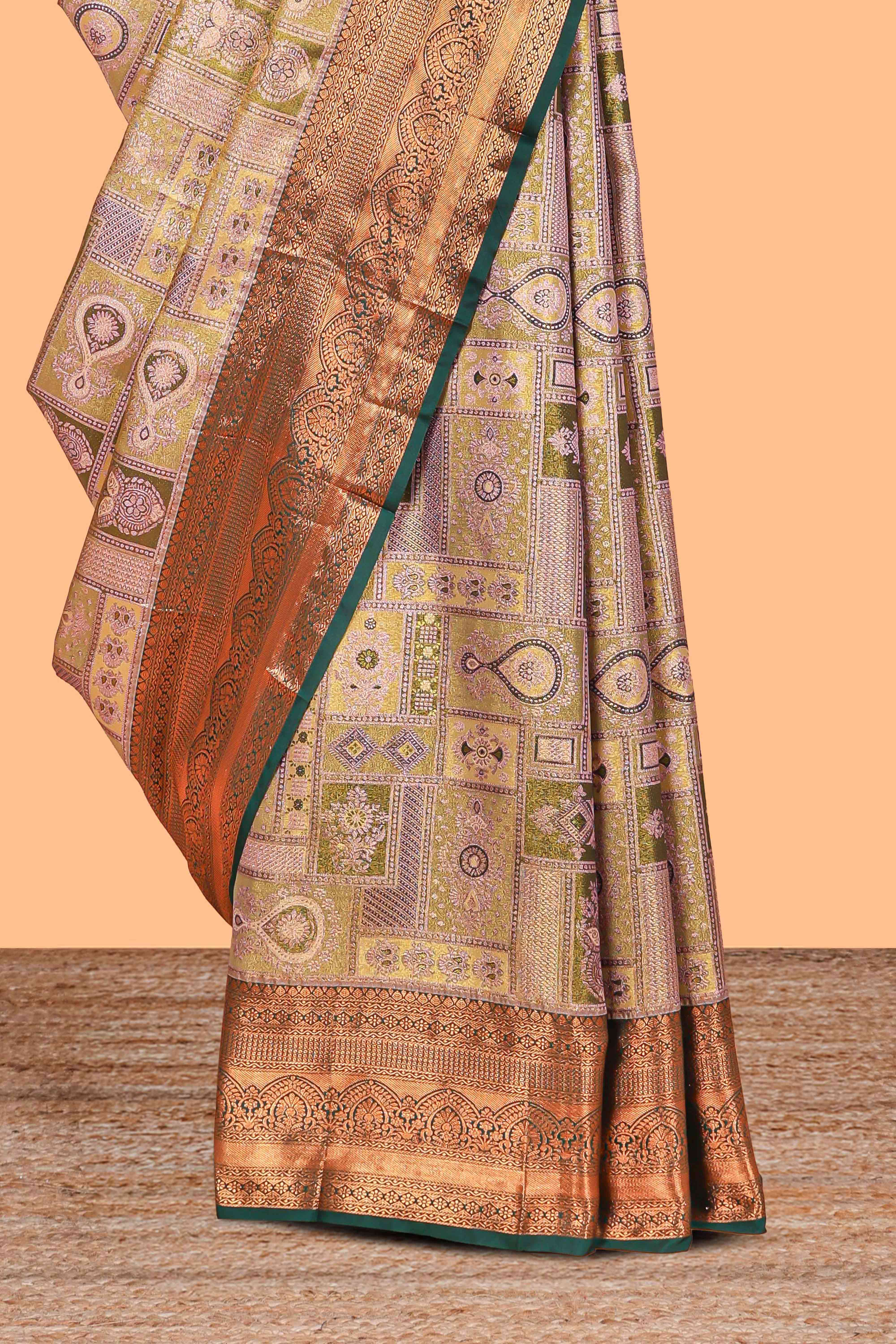 Pastel Sage Green Tissue Silk Saree with Antique Gold Zari Weaving and Dark Green Contrast Border and Contrast Blouse