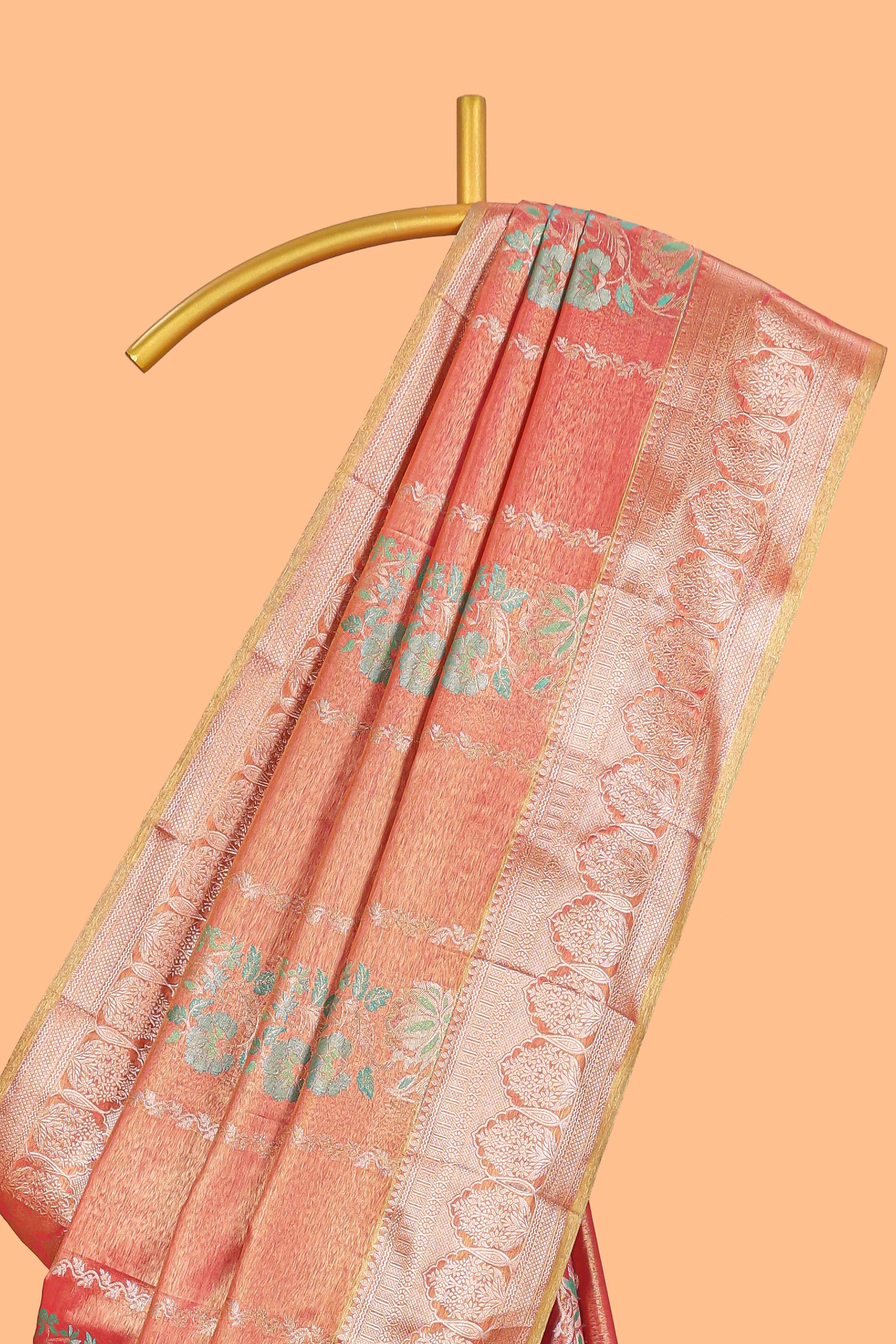 Coral Peach Pink Tissue Silk Saree with Silver Zari Weaving and PastelFloral Accents along with Matching Blouse