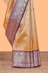 Mustard Gold Tissue Silk Saree with Antique Gold Zari Weaving and Contrast Wine Purple Border along with Contrast Blouse