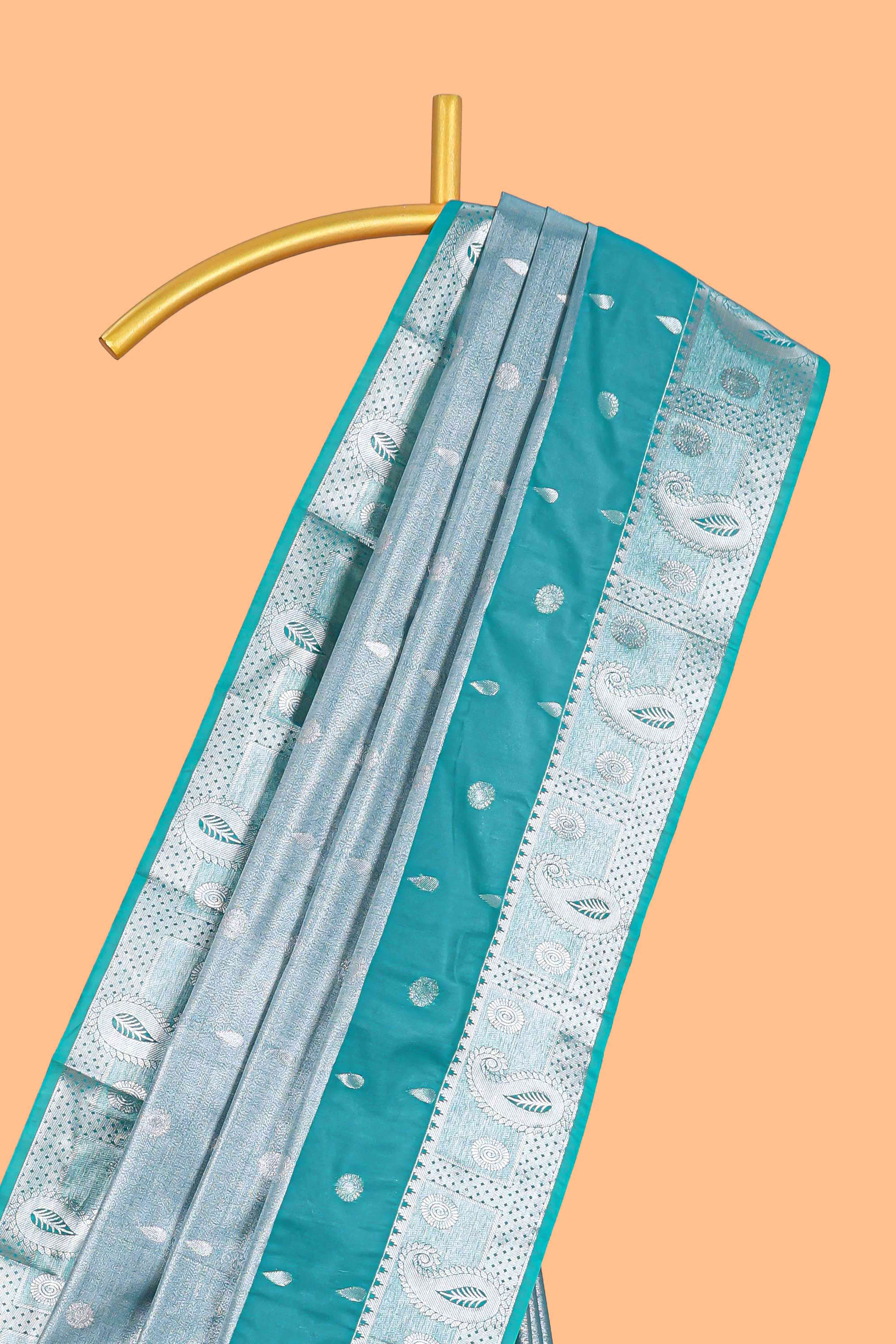 Peacock Teal Blue Tissue Silk Saree with Silver Zari Weaving and Contrast Teal Border along with Matching Blouse