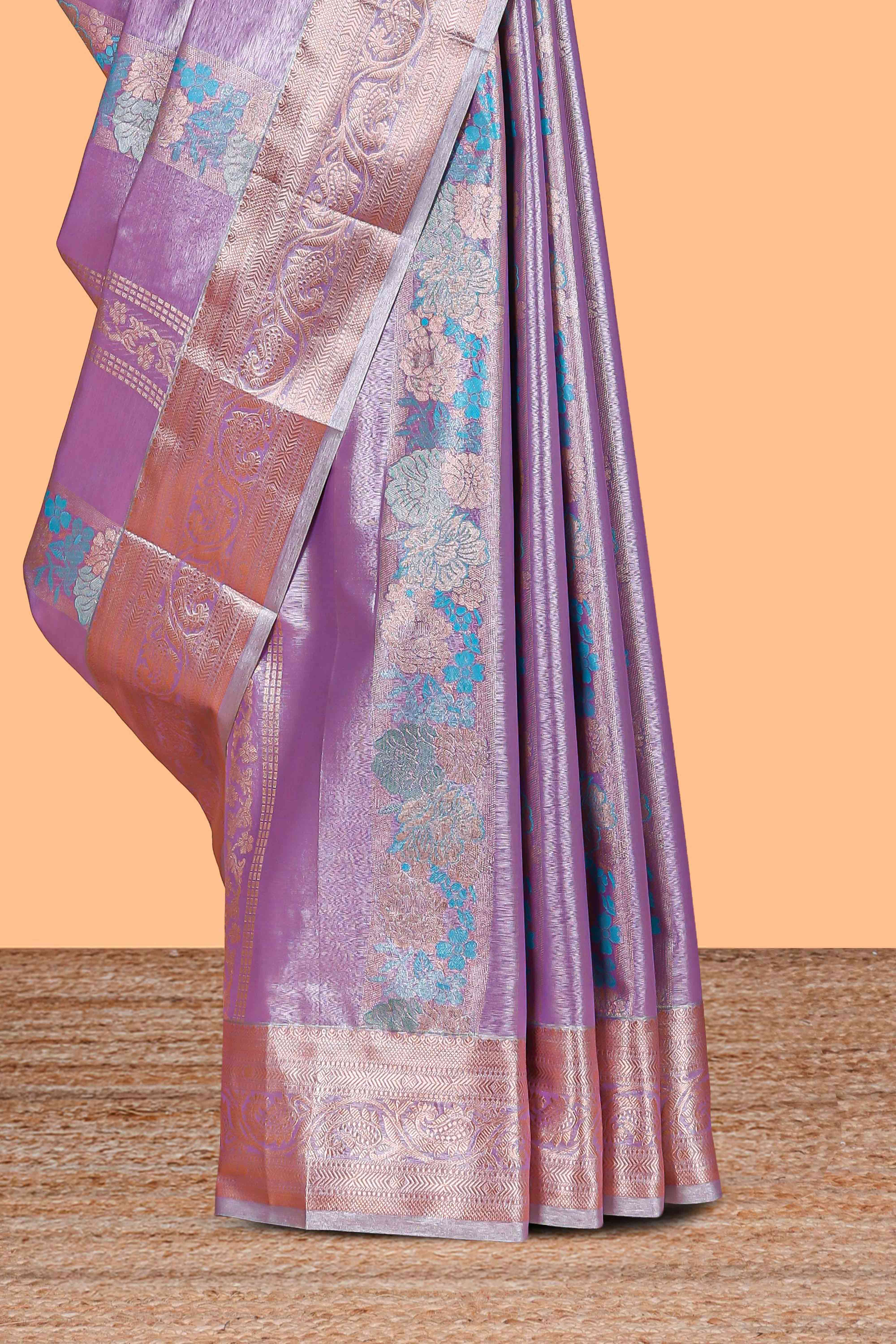 Lavender Tissue Silk Saree with Zari Weaving and PastelFloral Accents along with Matching Blouse