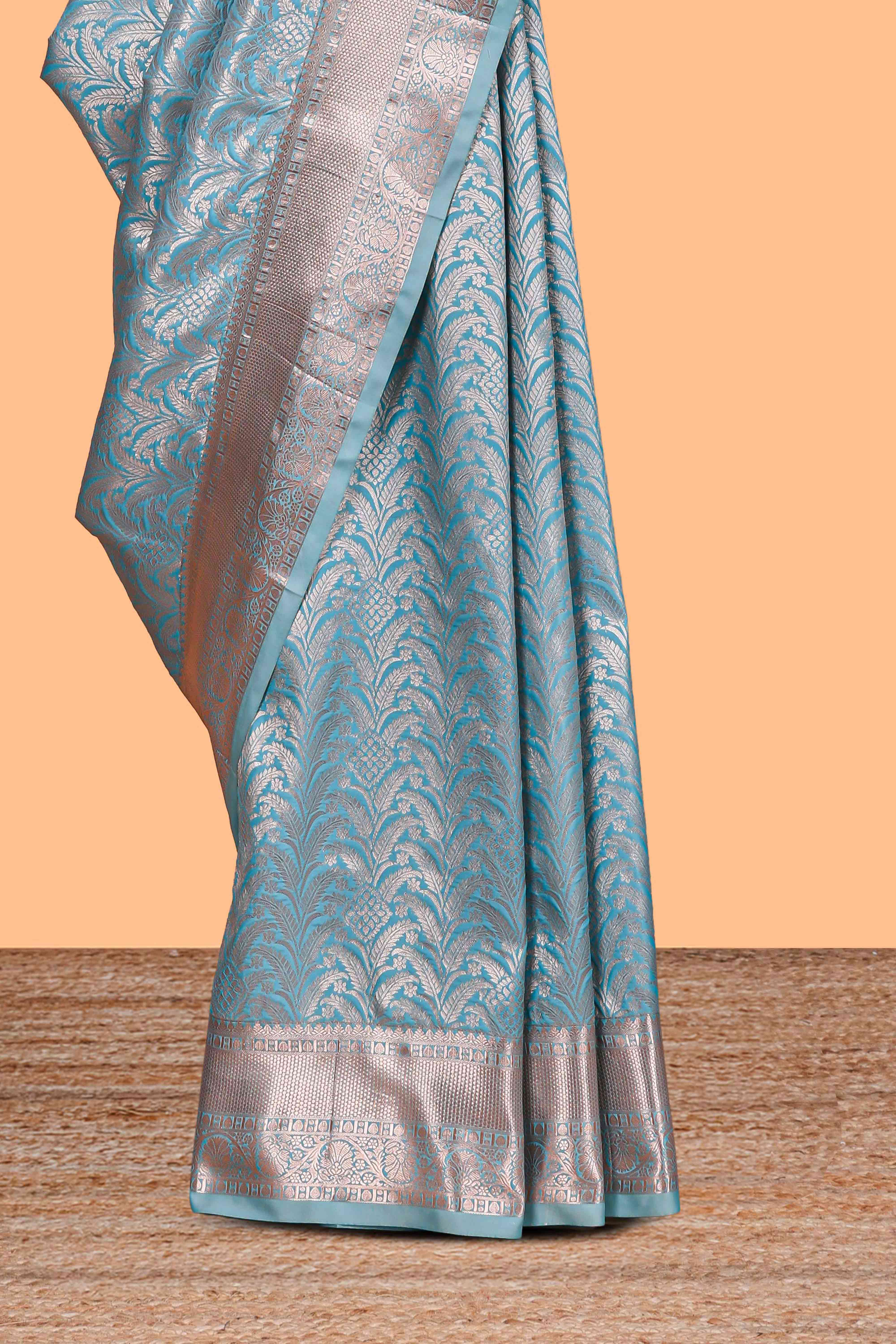 Sky Blue Color Tissue Silk Saree withZari Weaving Body and Border along with Matching Blouse