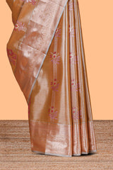 Champagne Gold Tissue Silk Saree with Silver Zari Weaving and Pink Floral Accents along with Matching Blouse