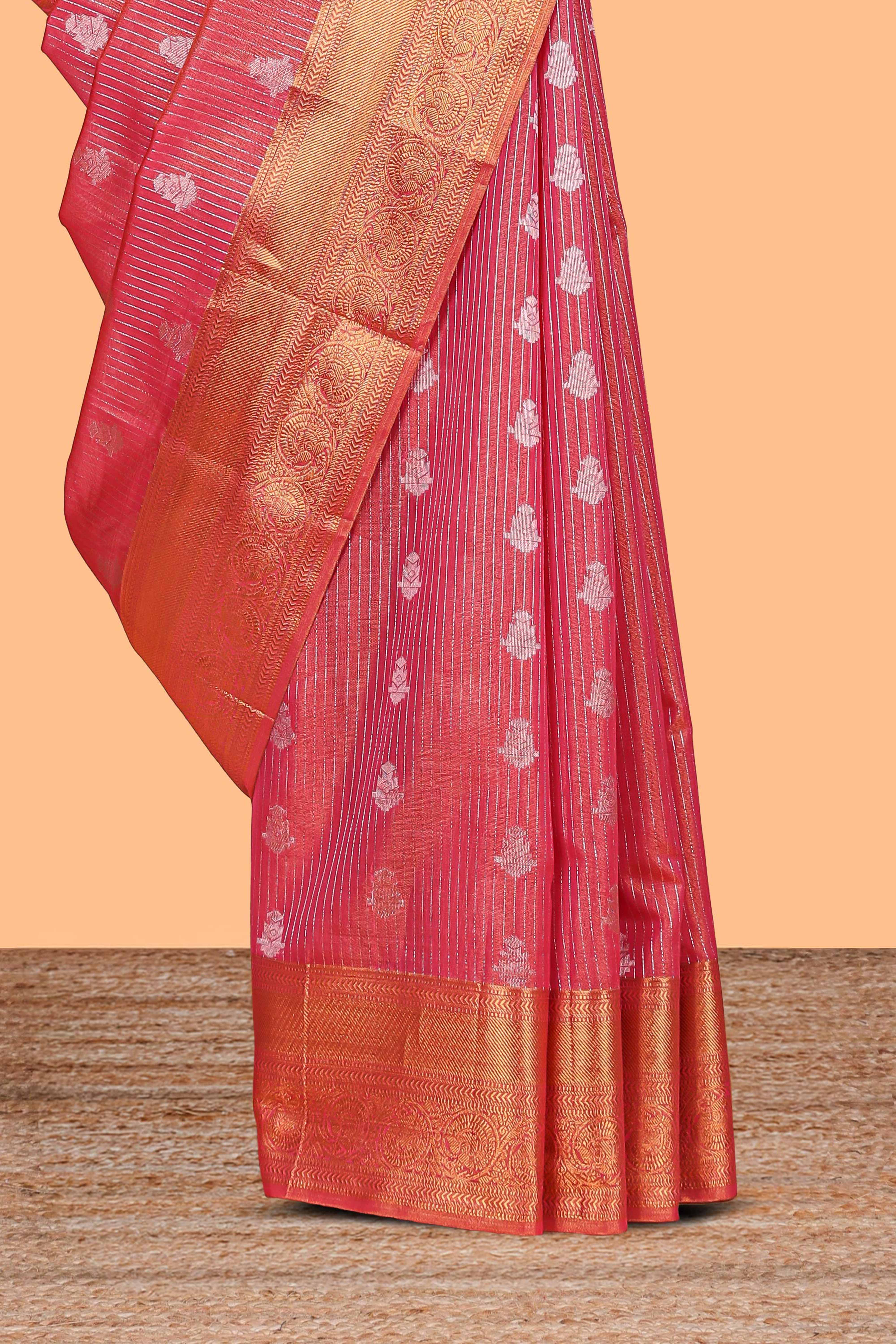 Rani Pink Tissue Silk Saree with Antique Gold Zari Weaving and Traditional Floral Motifs along with Contrast Blouse