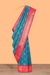 Blue Color Tissue Silk Saree withZari Checksand Buttas Weaving Body and Contrast Border along with Contrast Blouse