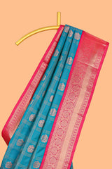 Blue Color Tissue Silk Saree withZari Checksand Buttas Weaving Body and Contrast Border along with Contrast Blouse