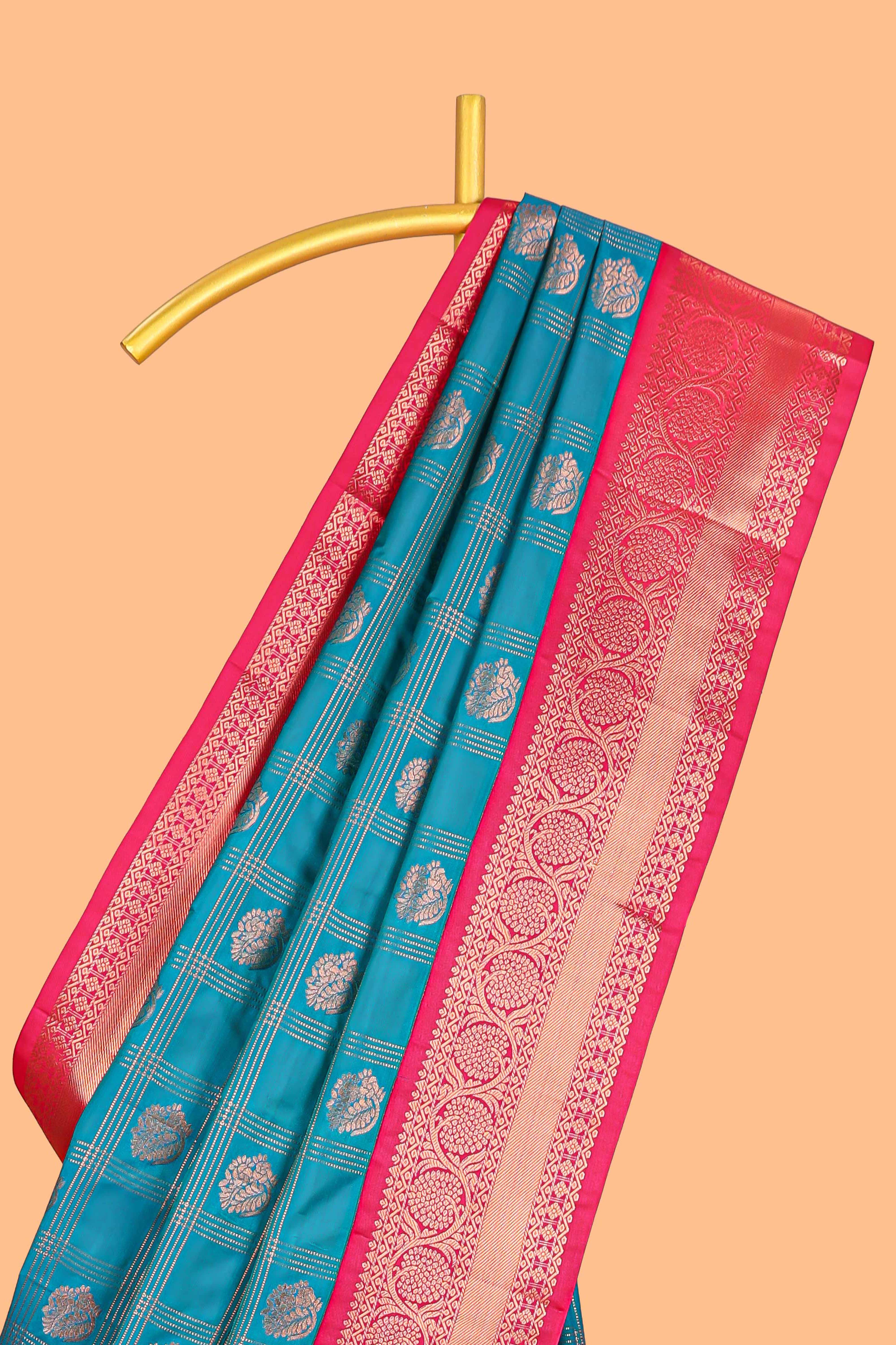 Blue Color Tissue Silk Saree withZari Checksand Buttas Weaving Body and Contrast Border along with Contrast Blouse