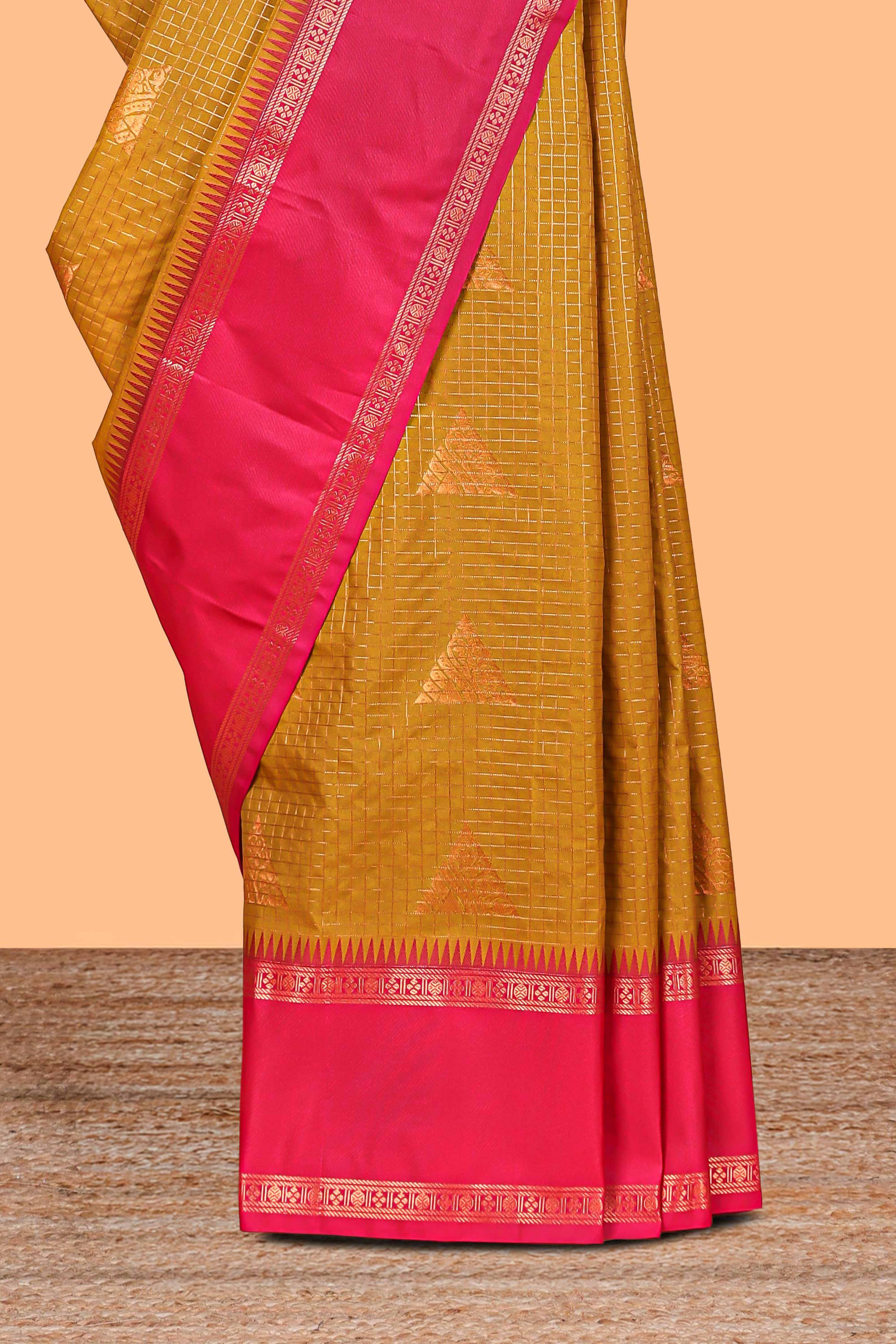 Turmeric Yellow Color Tissue Silk Saree withZari Checksand Buttas Weaving Body and Contrast Border along with Contrast Blouse