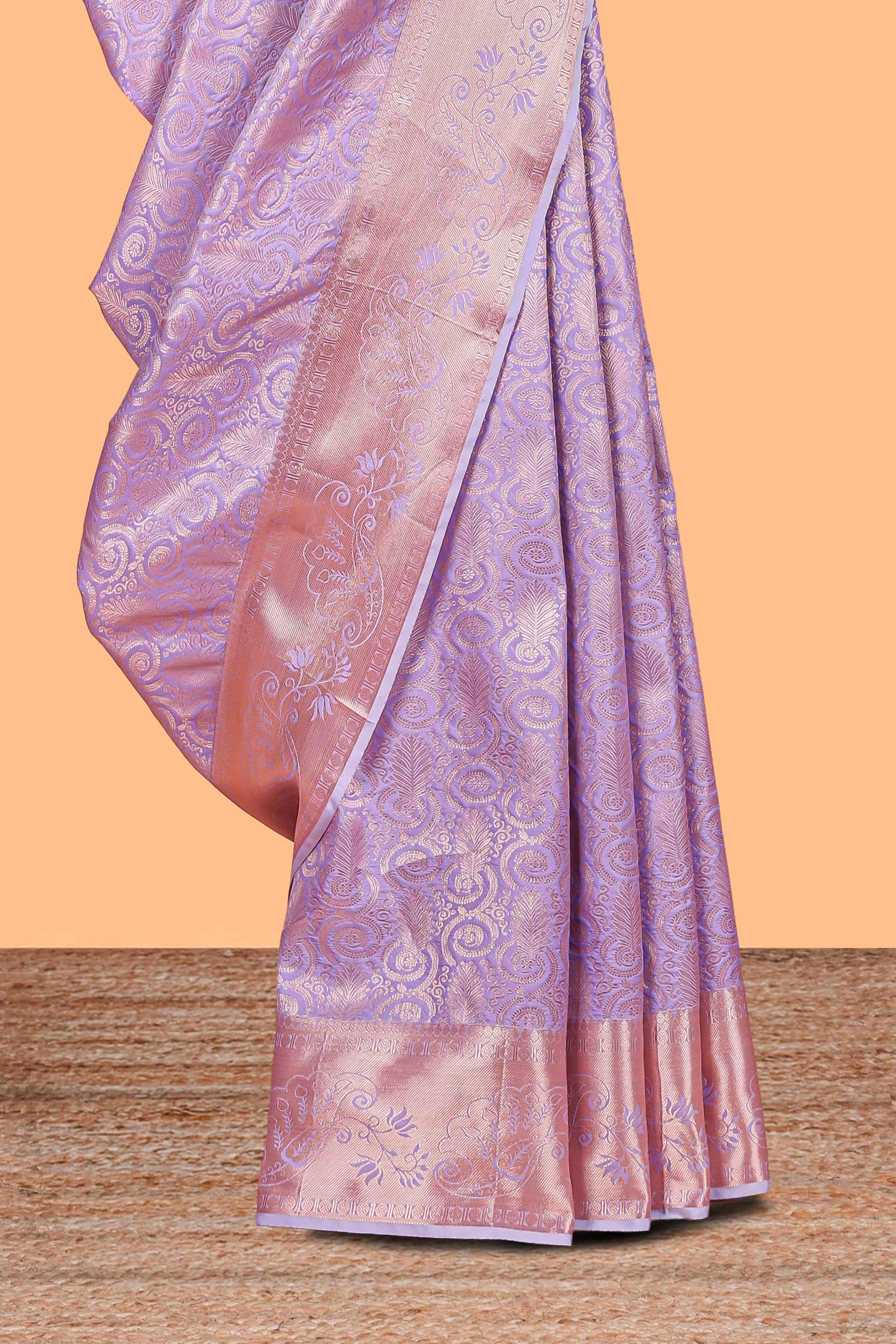 Lavender Color Tissue Silk Saree withZari Weaving Body and Contrast Border along with Matching Blouse