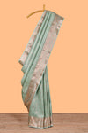 Pastel Green Color Tissue Silk Saree withZari Weaving Body and Contrast Border along with Matching Blouse