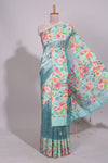 Blue geometric design tissue saree with contrast floral print border and printed blouse