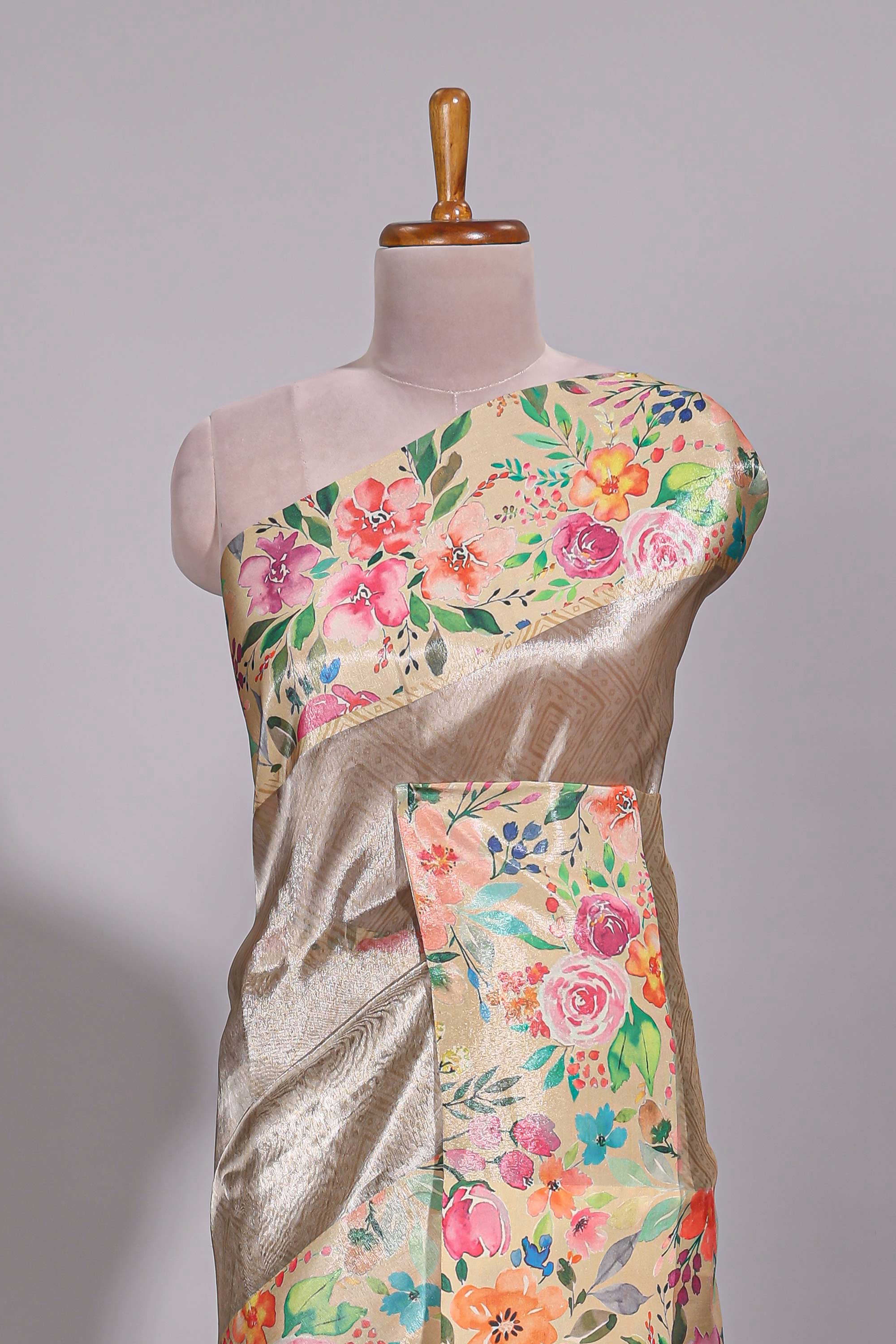 Brown geometric design tissue saree with contrast floral print border and printed blouse