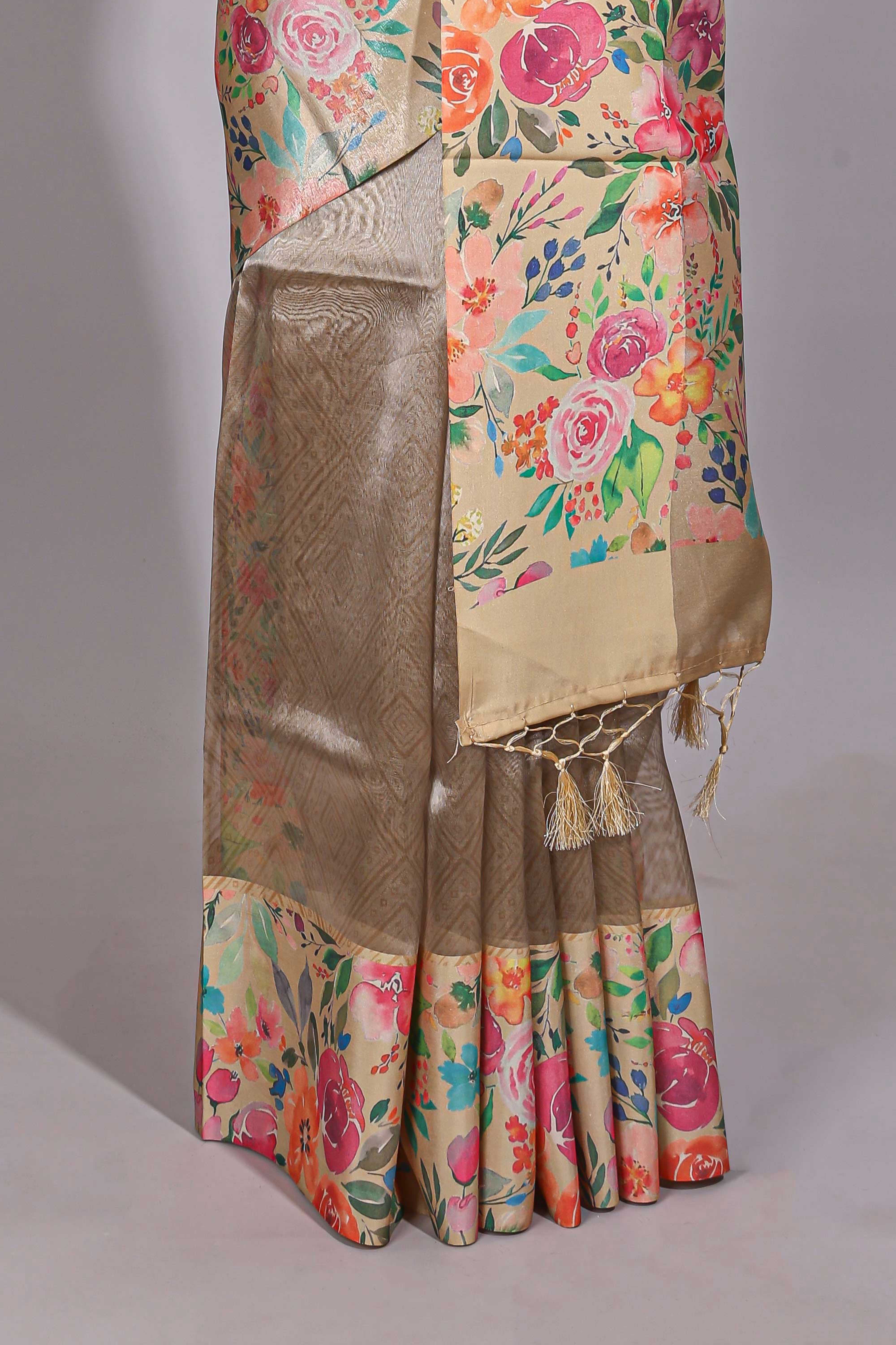 Brown geometric design tissue saree with contrast floral print border and printed blouse