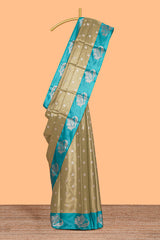 Mustard zari motifs design tissue saree with contrast peacock zari border and motifs blouse