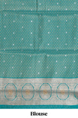 Mustard zari motifs design tissue saree with contrast peacock zari border and motifs blouse