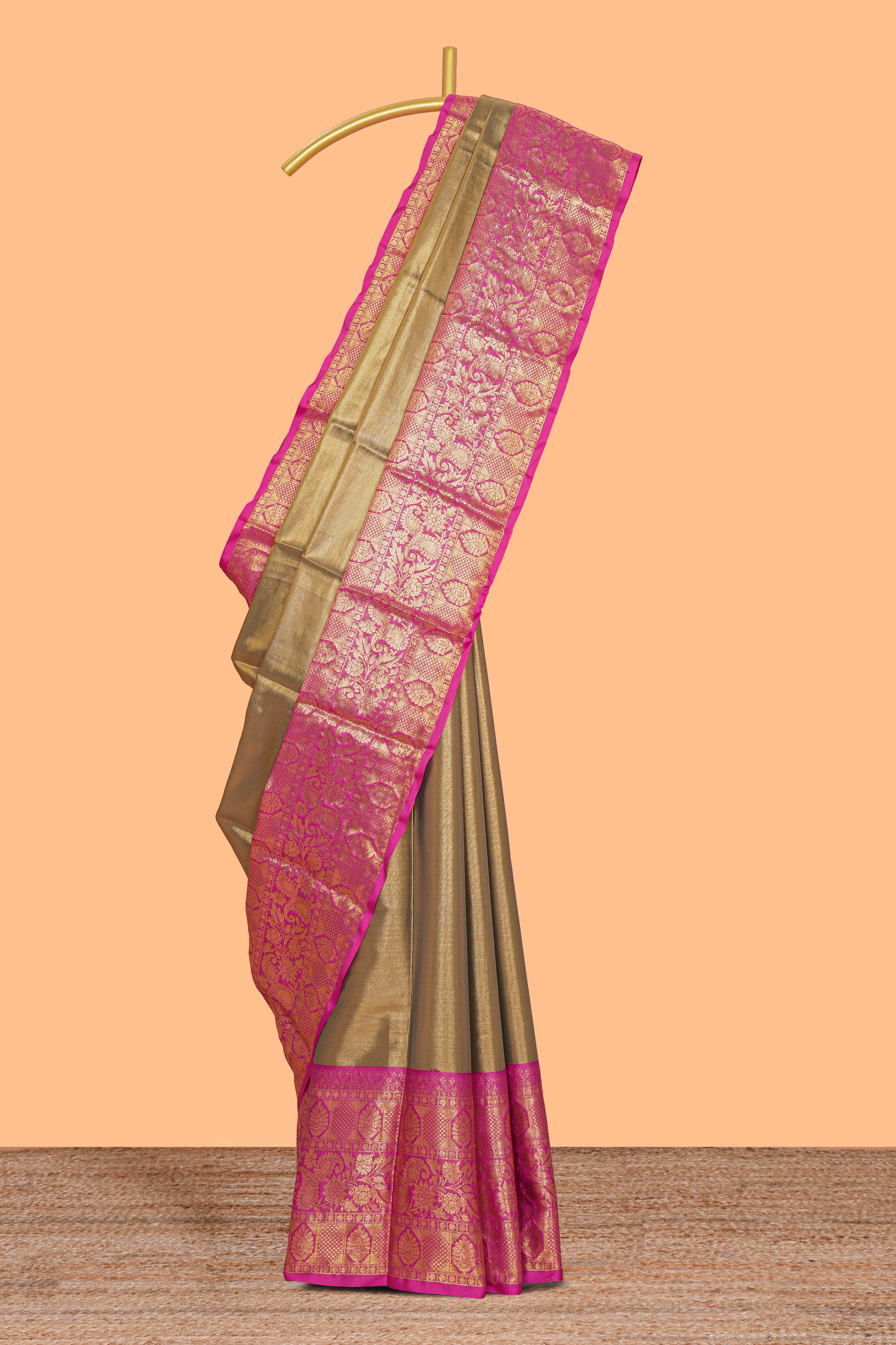 Mustard plain design tissue saree with contrast zari border and blouse