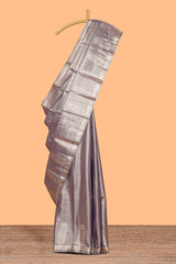 Grey floral design tissue saree with self zari border and matching blouse