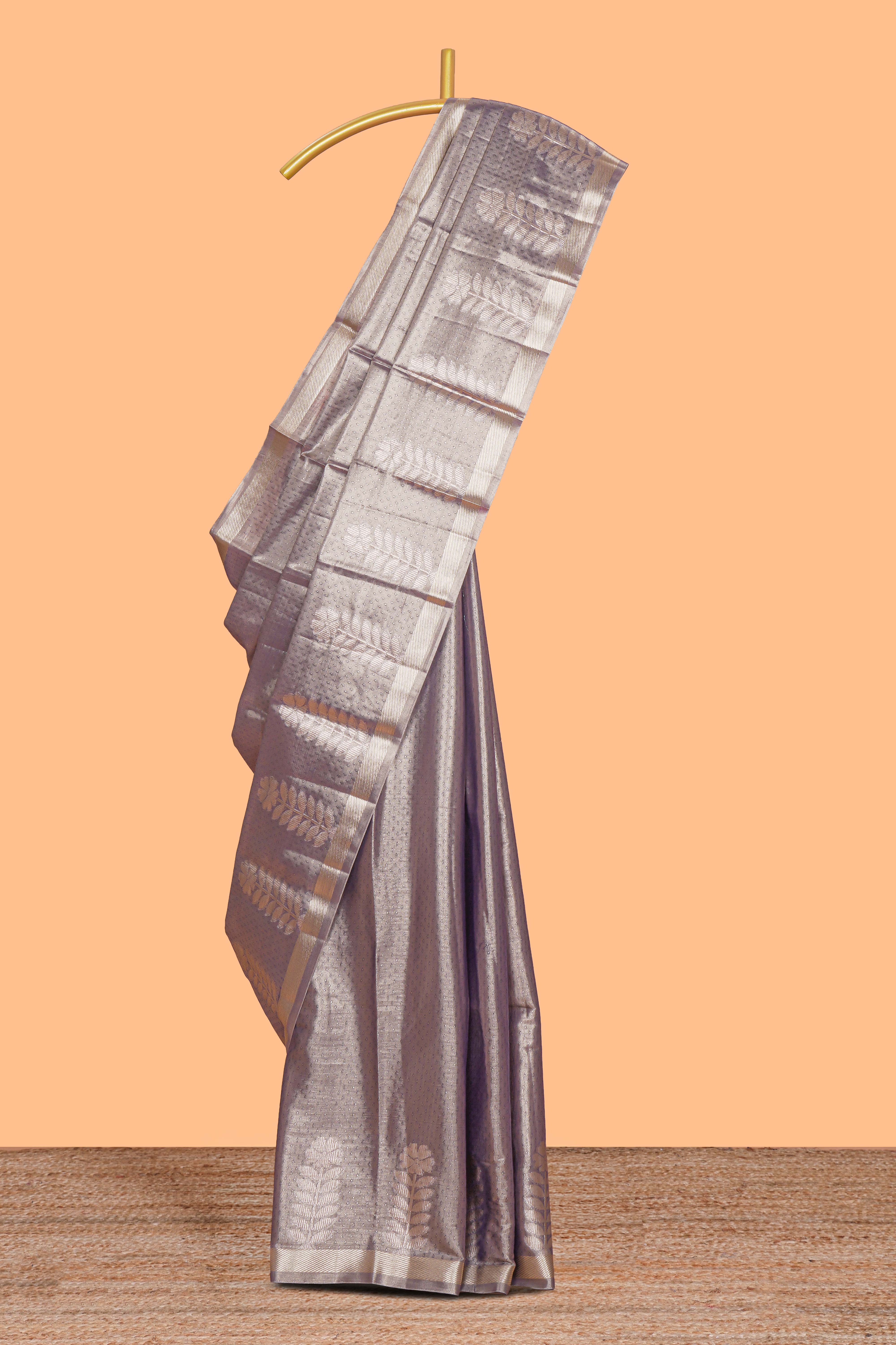 Grey floral design tissue saree with self zari border and matching blouse
