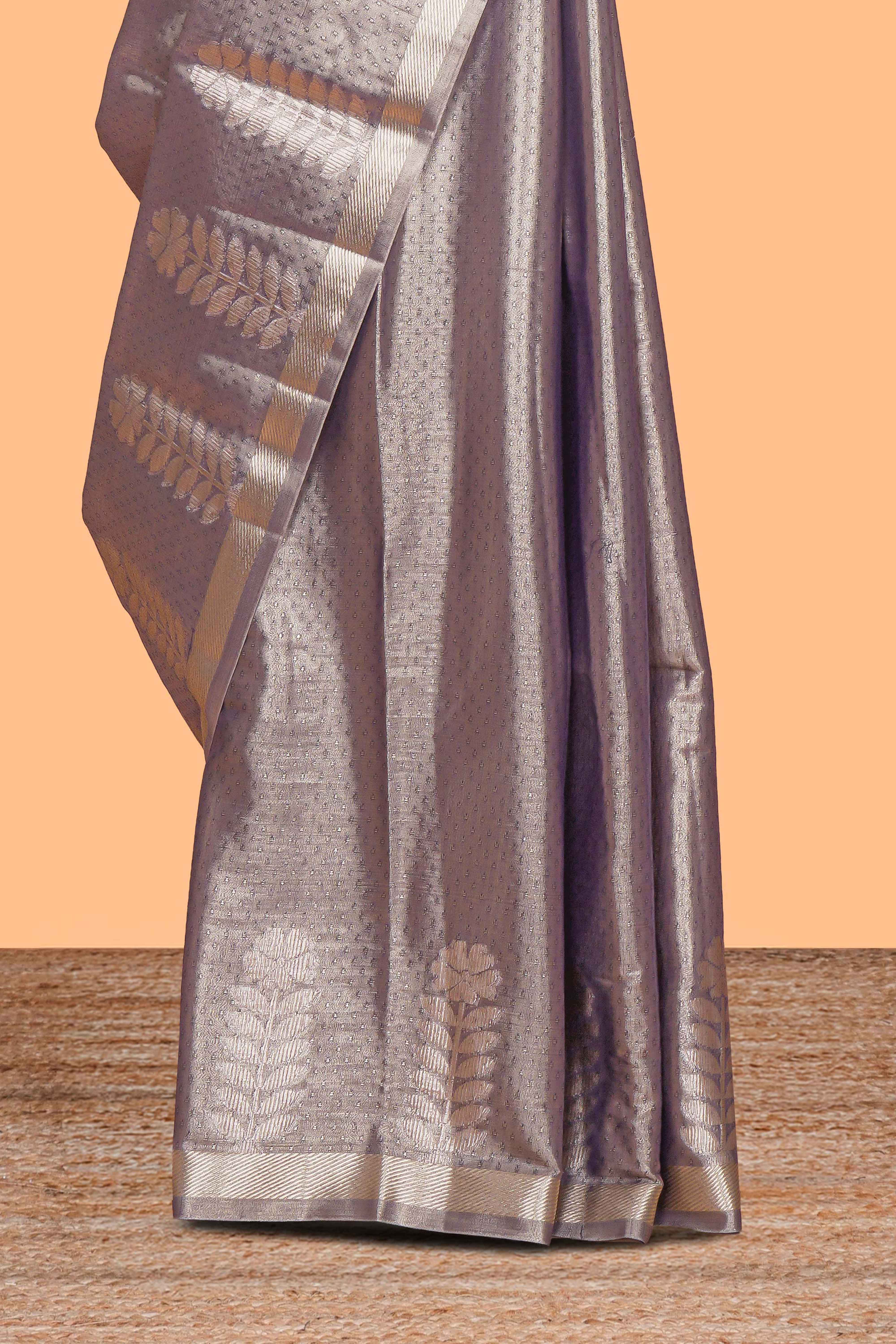 Grey floral design tissue saree with self zari border and matching blouse