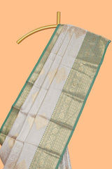 Grey zari motifs design tissue saree with contrast zari border and zari blouse